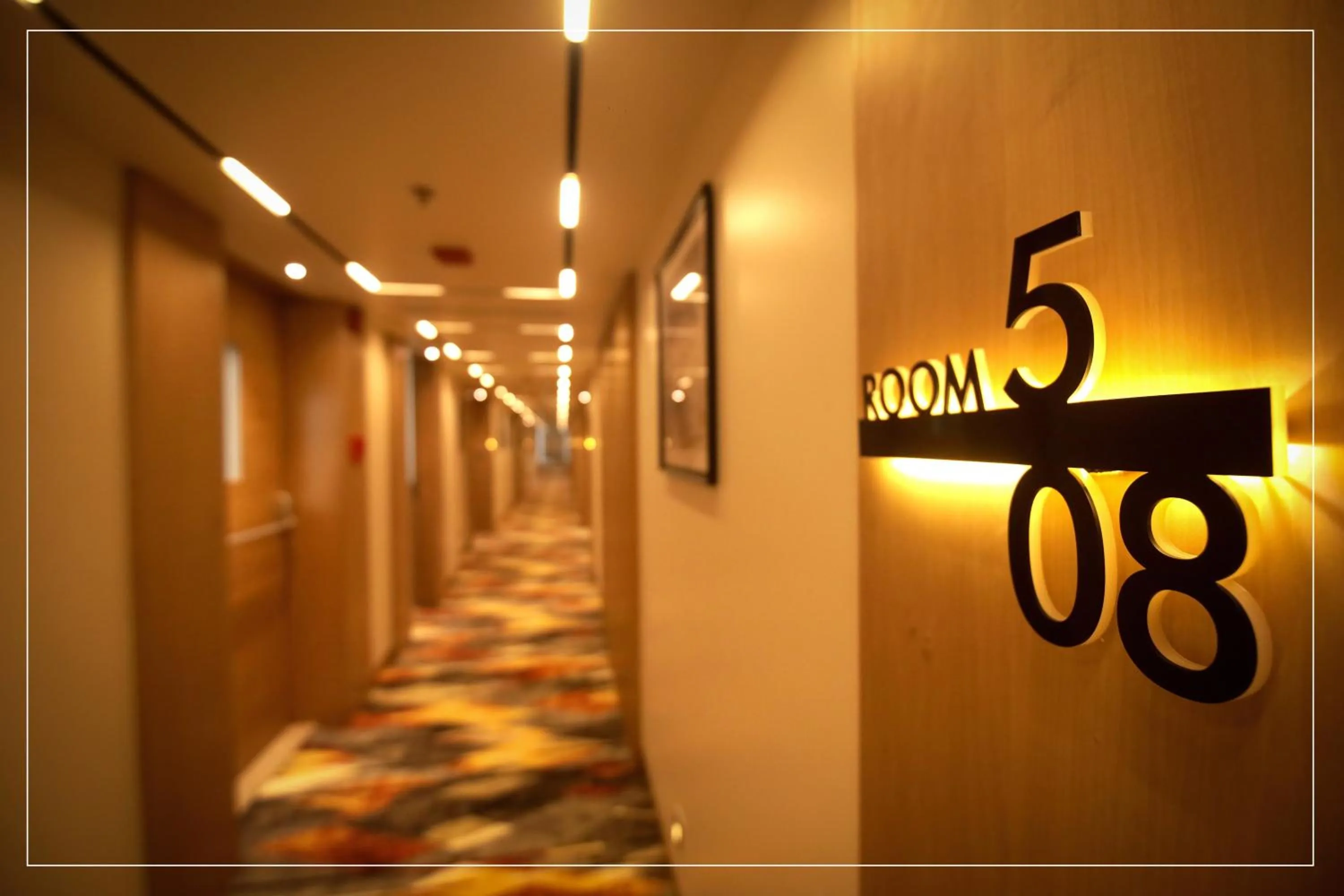 Property logo or sign in Ramada Encore by Wyndham Siliguri Sevoke Road