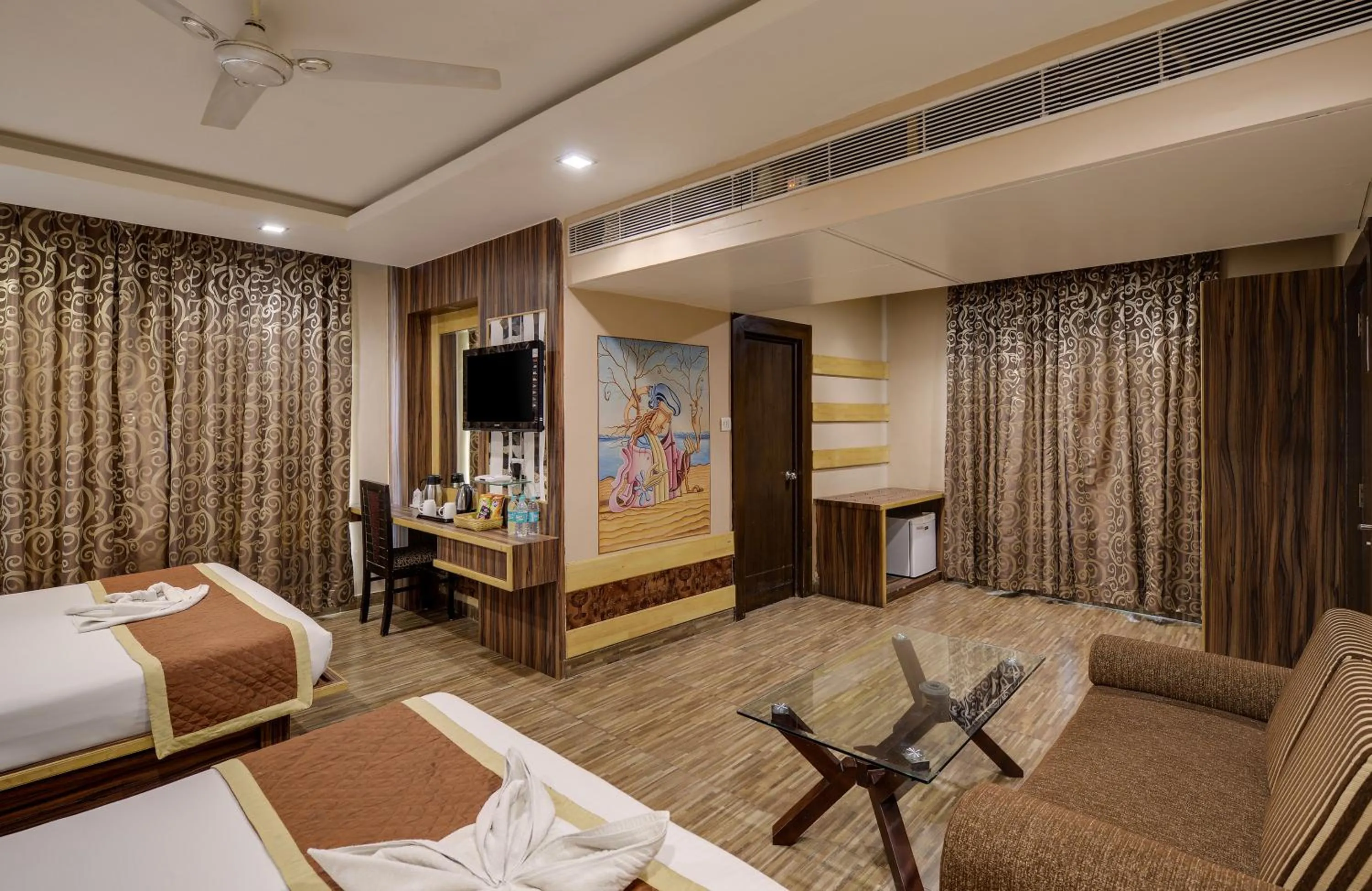 Photo of the whole room, Bed in The Royal Melange Beacon