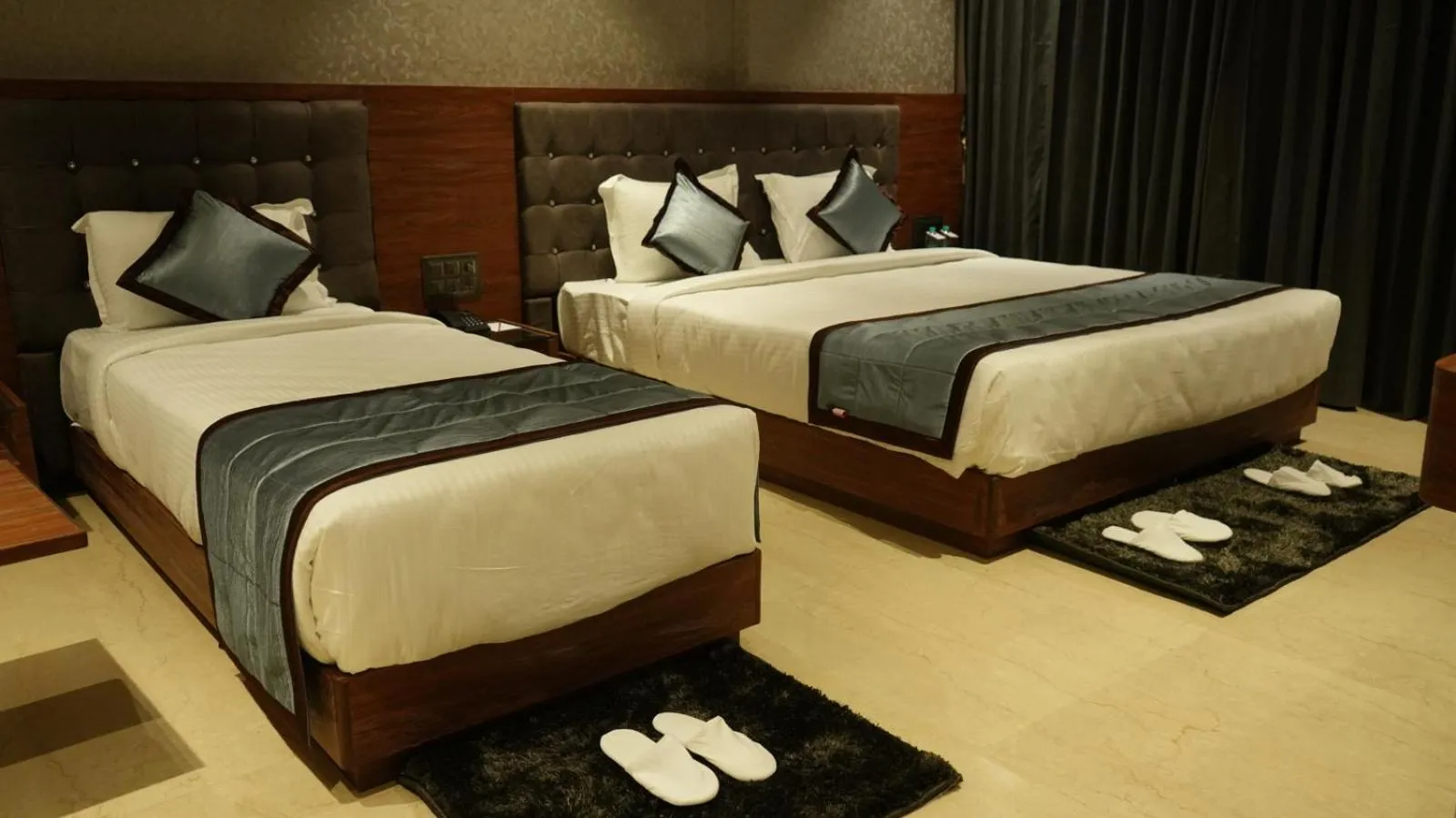 Bed in Alaukik Hotel