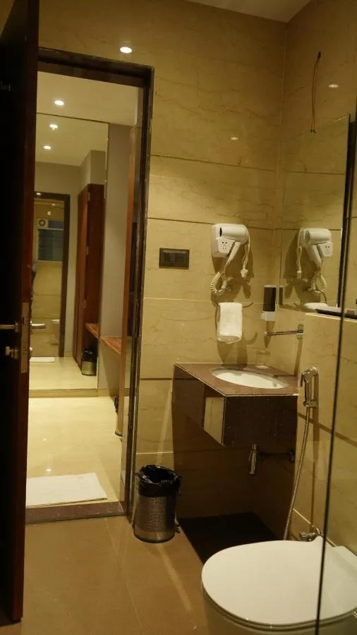 Bathroom in Alaukik Hotel