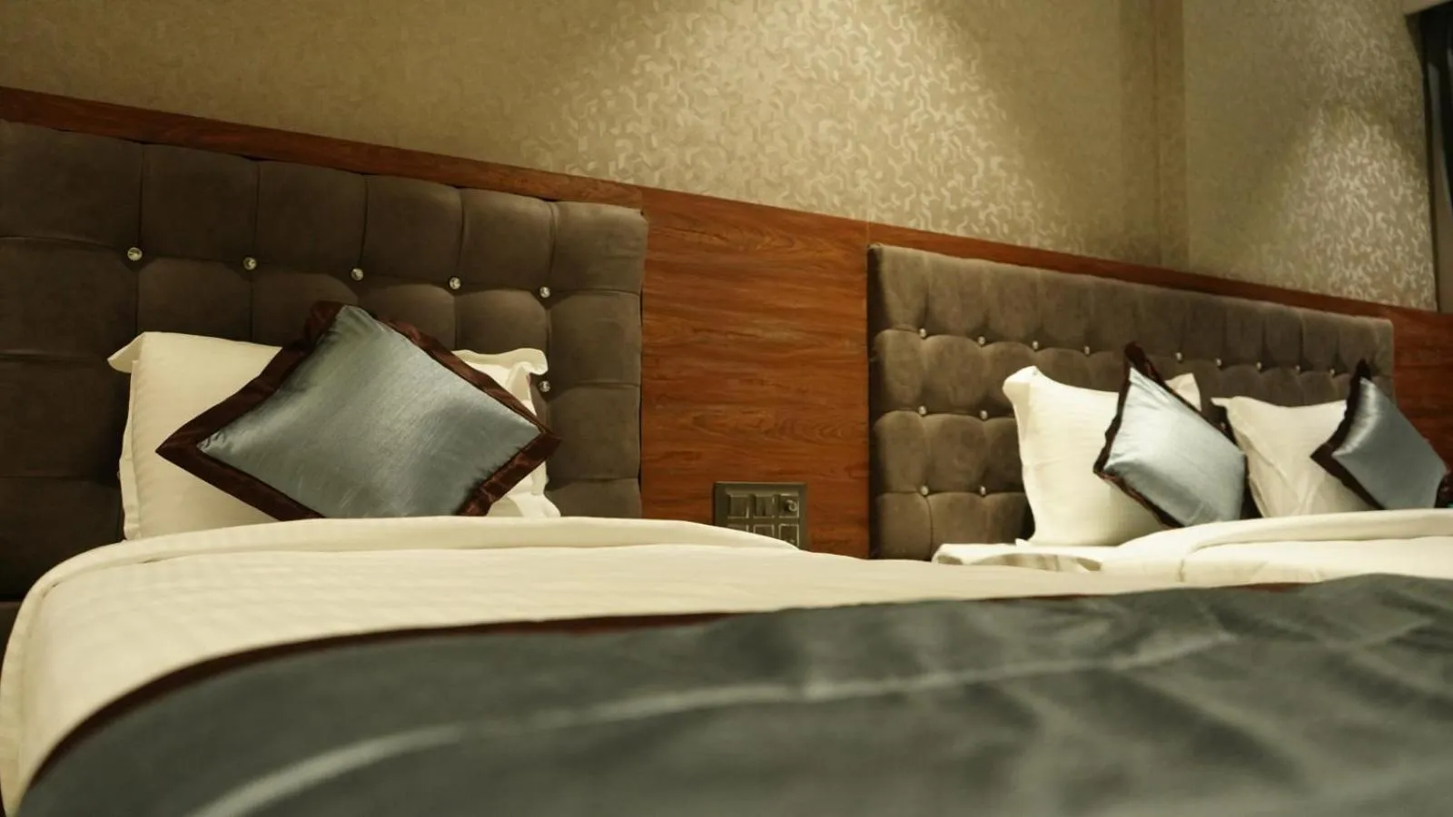 Bed in Alaukik Hotel