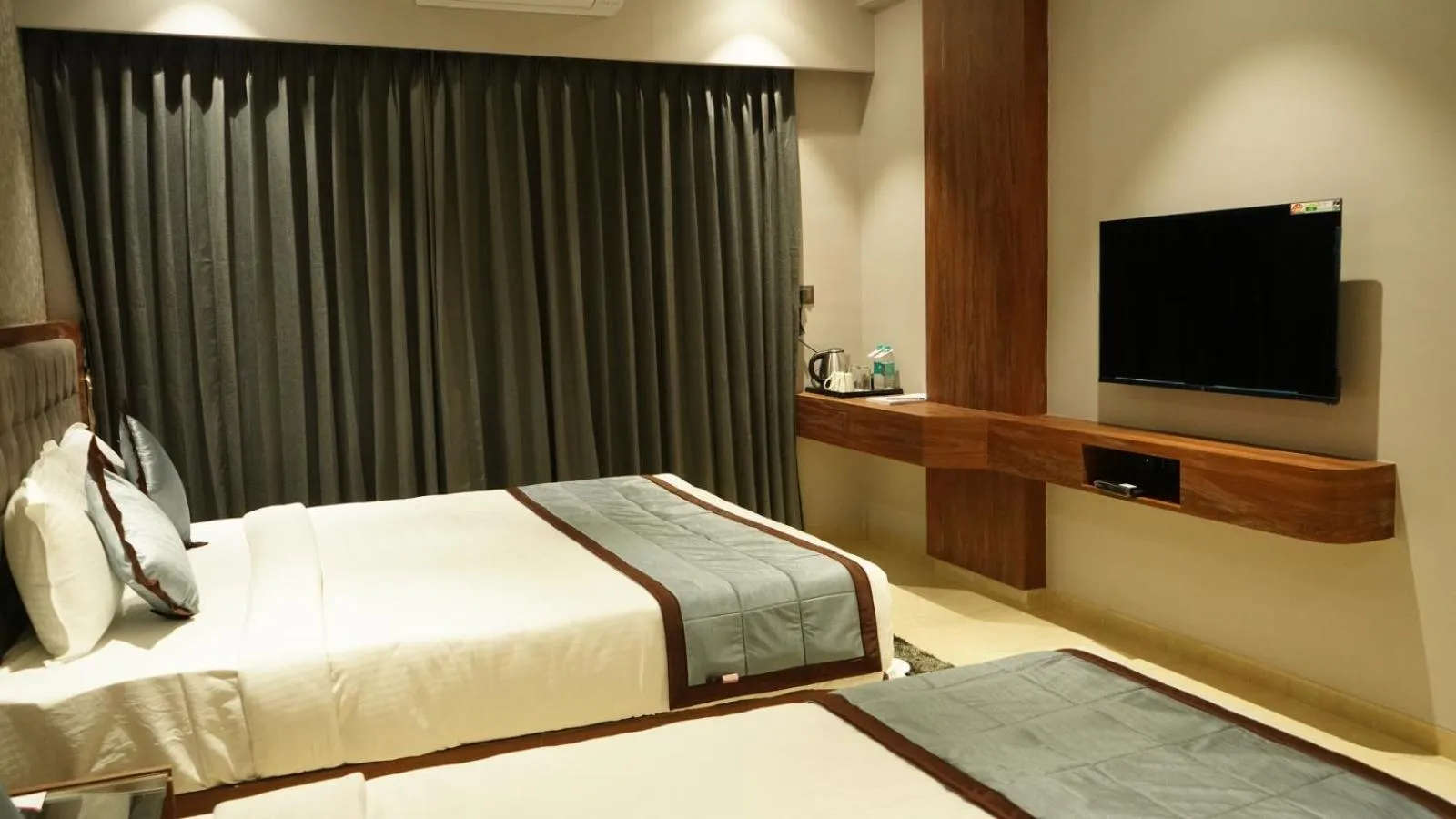 Bed in Alaukik Hotel