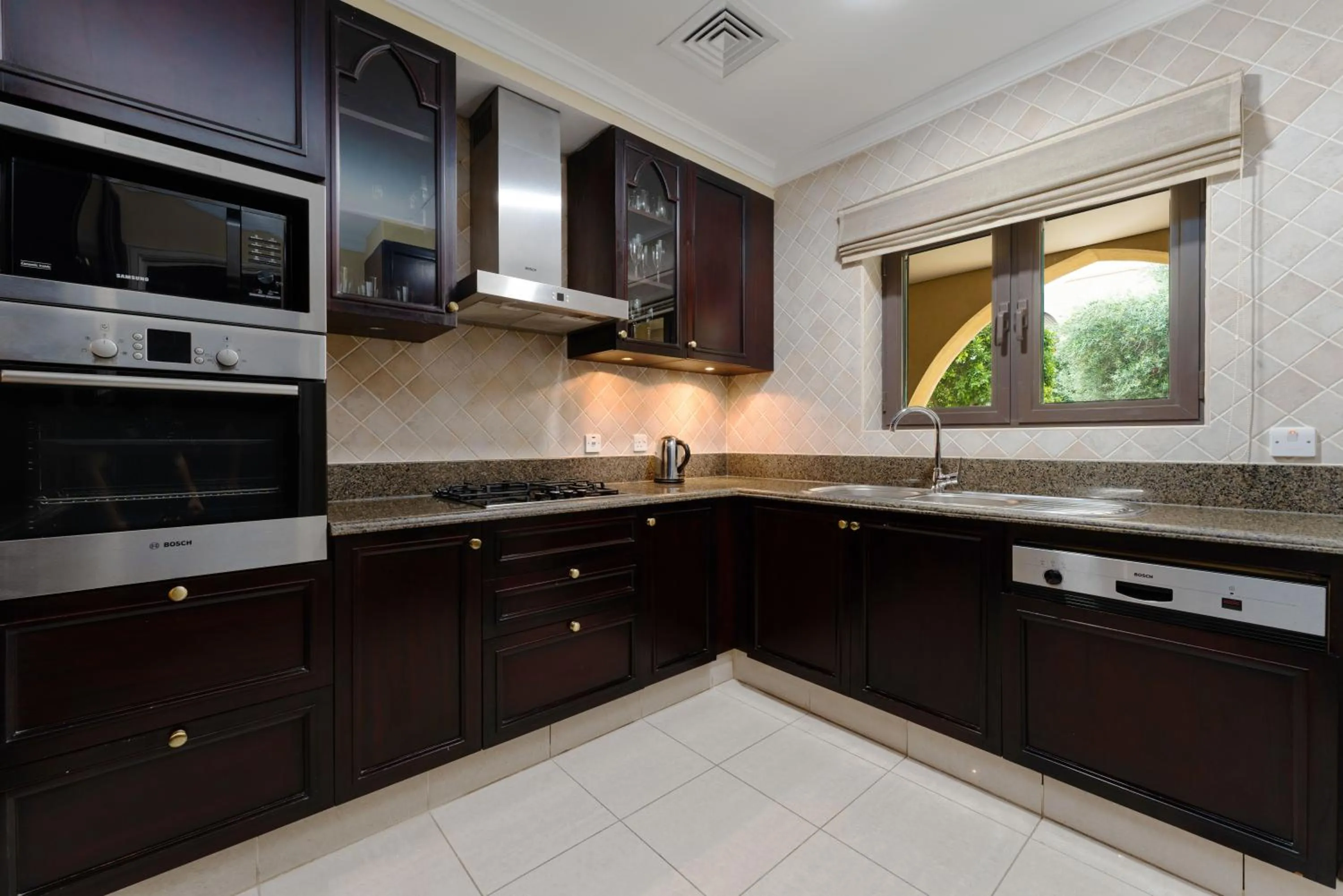 kitchen in Maison Privee - Elite Apt Connected to Dubai Mall & Burj Khalifa