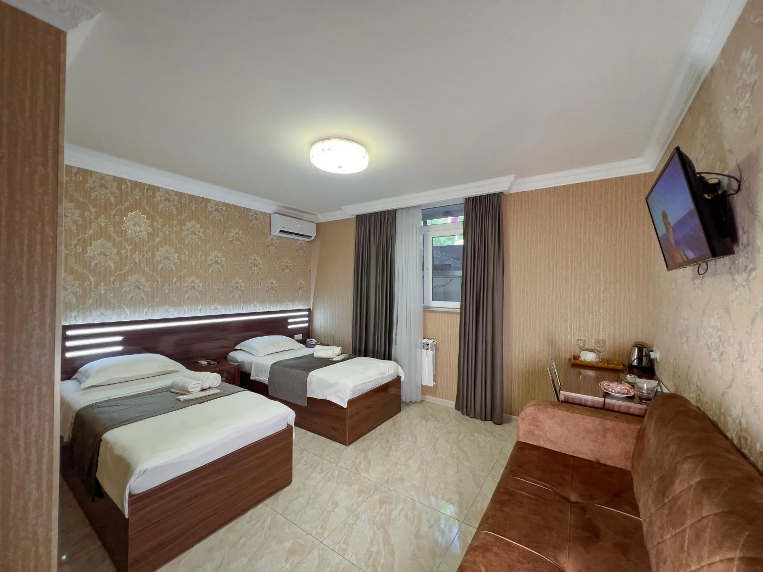 Bed in Opera Avenue Hotel