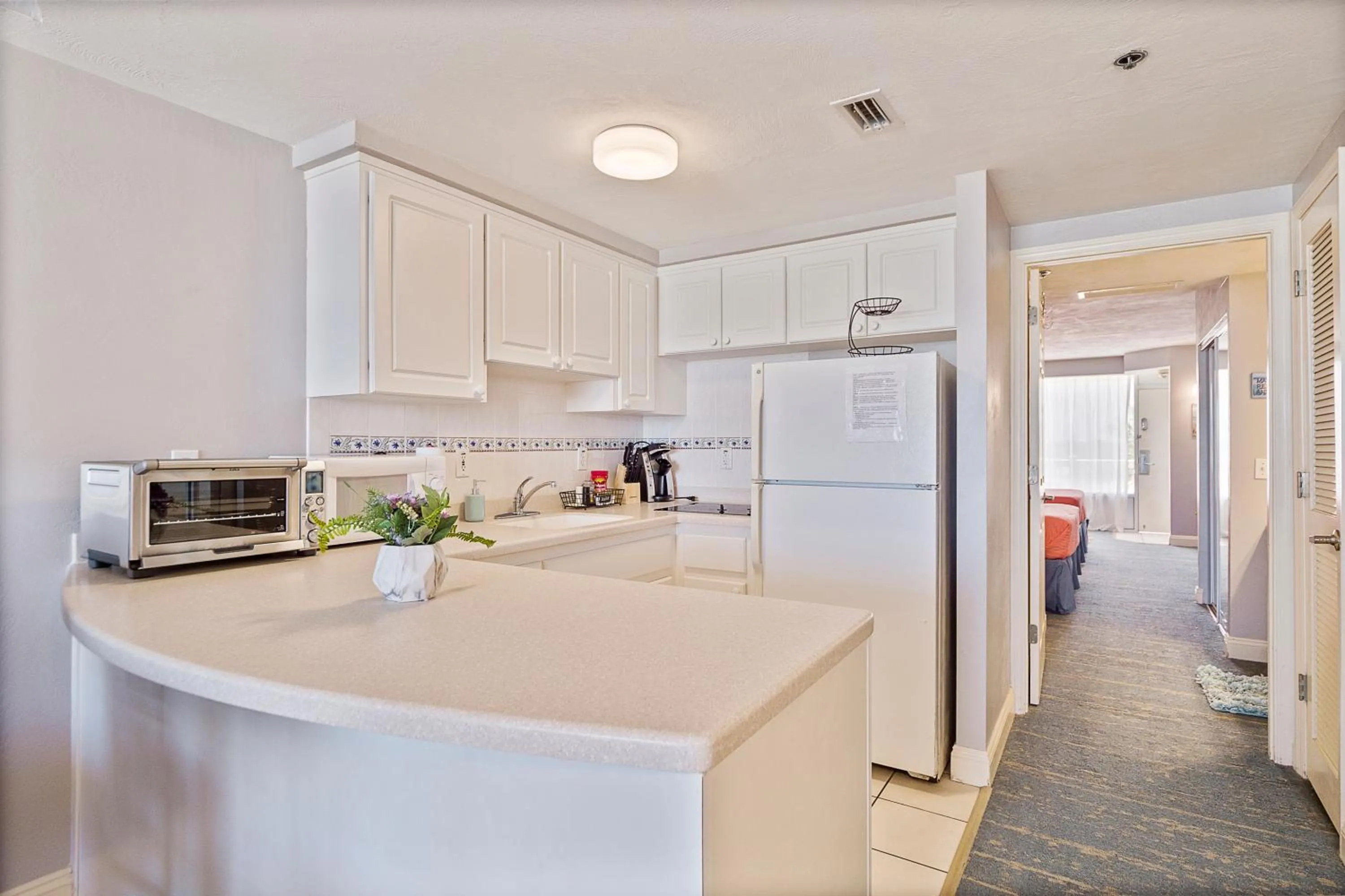 Kitchen or kitchenette in Sunrise & Beach View - Daytona Beach Resort