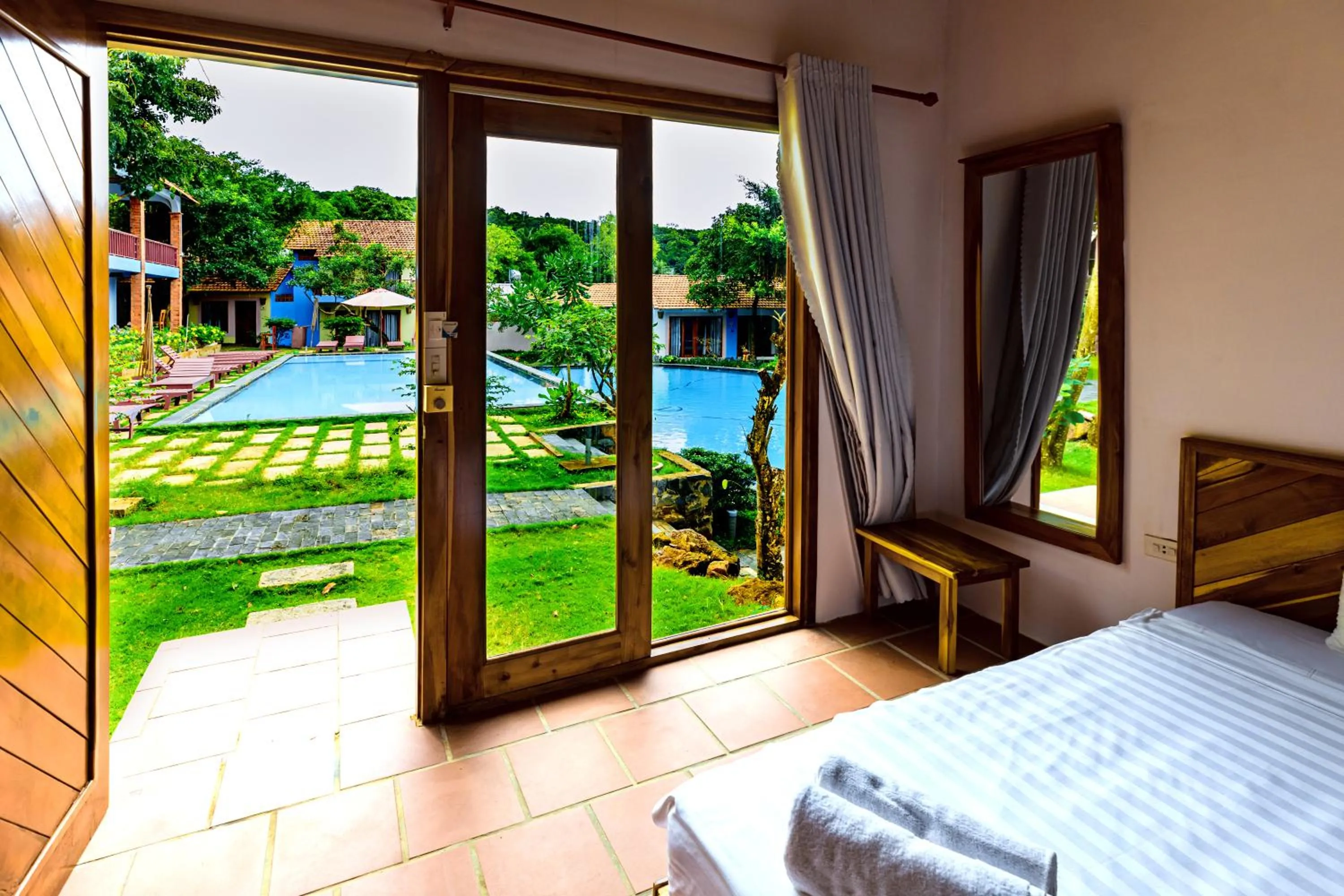 Pool view, Bed in Star Hill Village Resort Phu Quoc