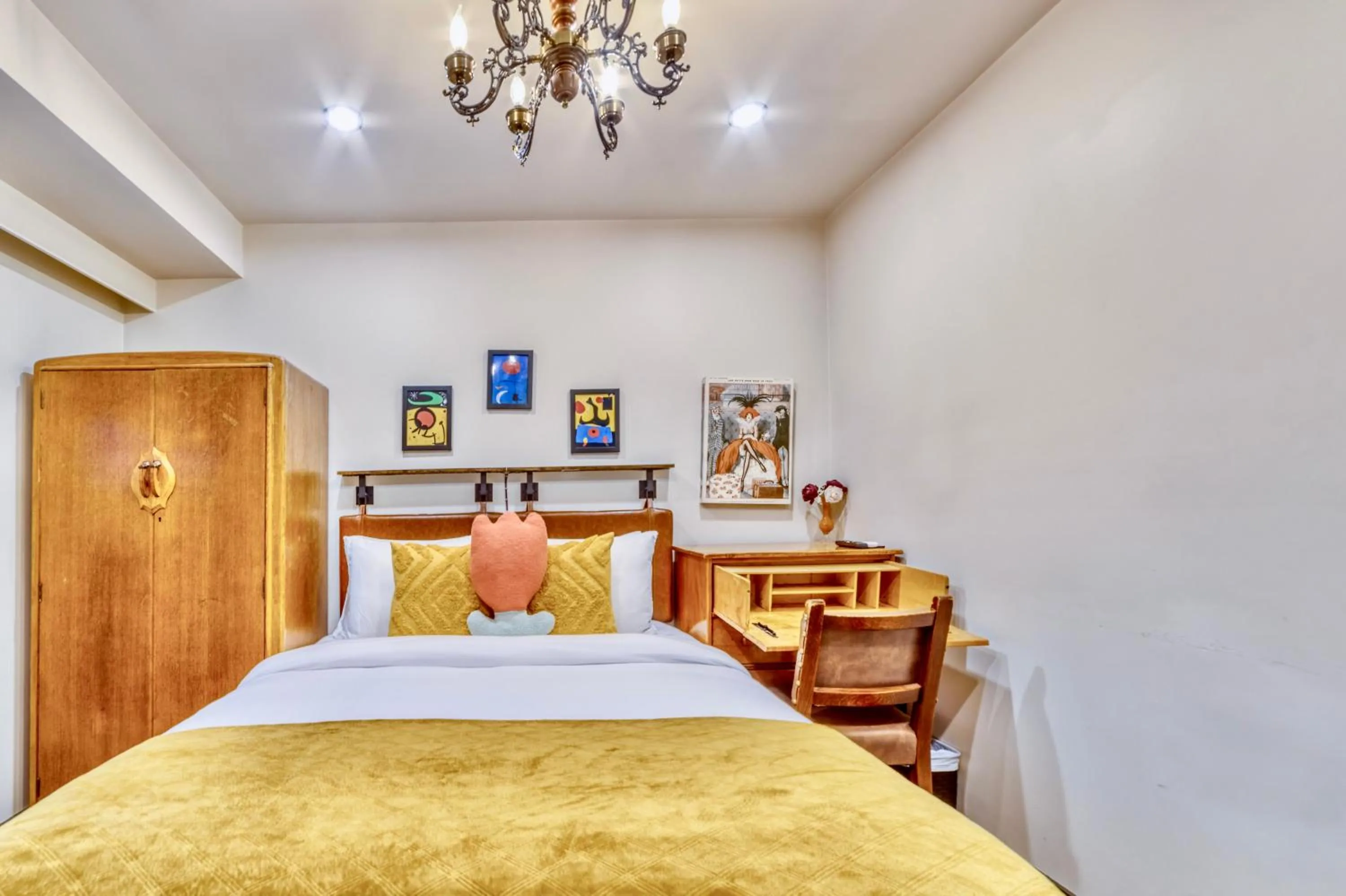 Bed in Neocolonial Nouveau Kensington Vacation Home