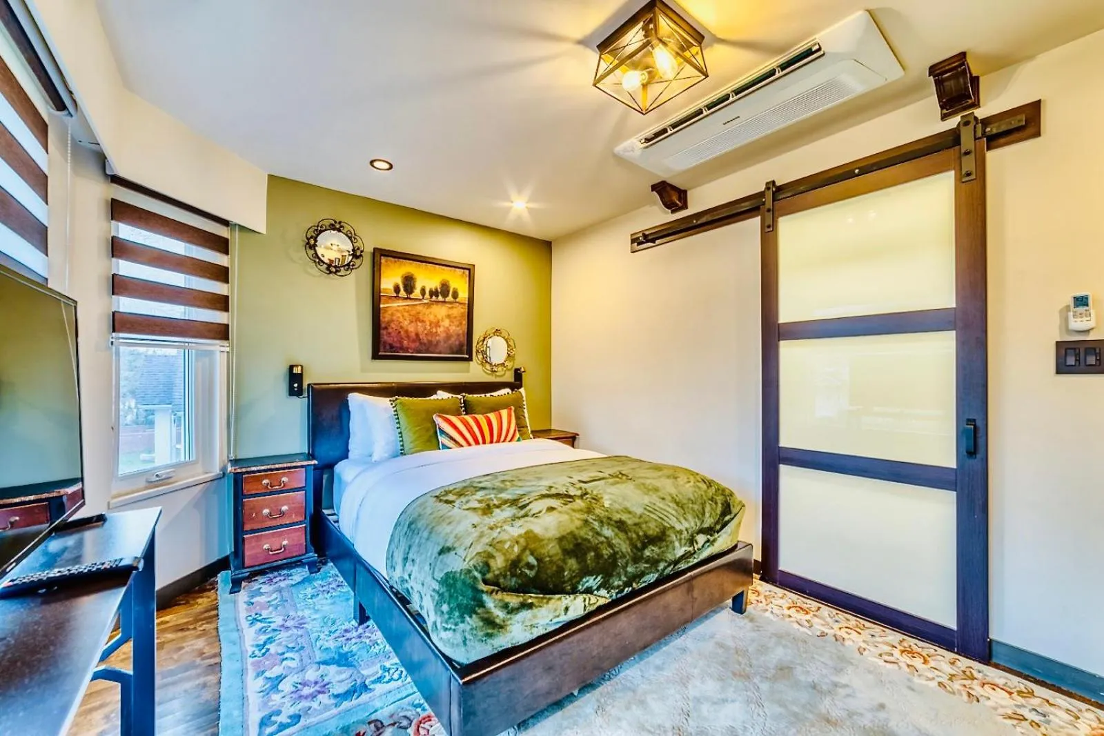 Bed in Neocolonial Nouveau Kensington Vacation Home