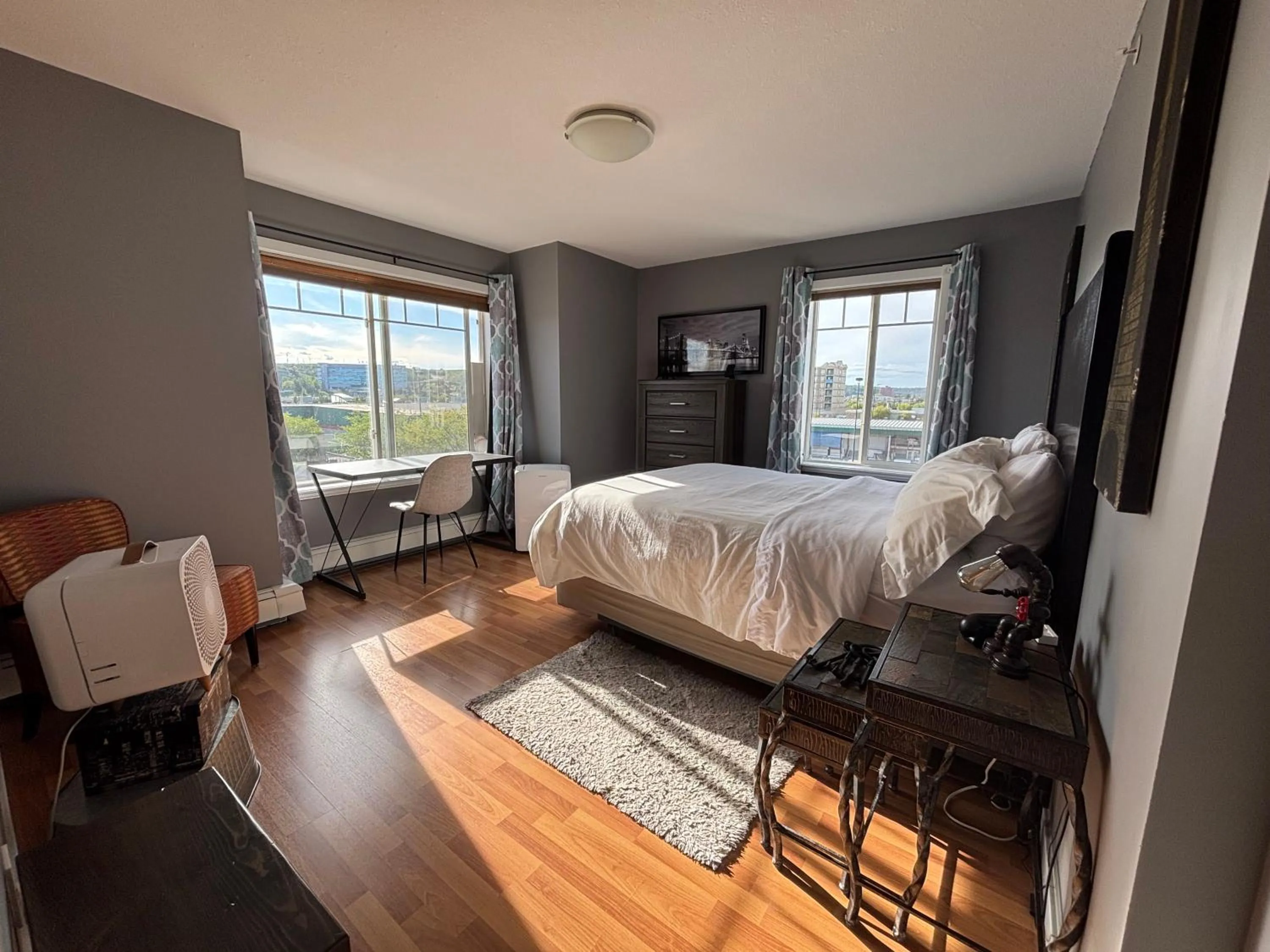 Bedroom, Bed in Top Floor Riverfront Condo with Stellar Sunsets!