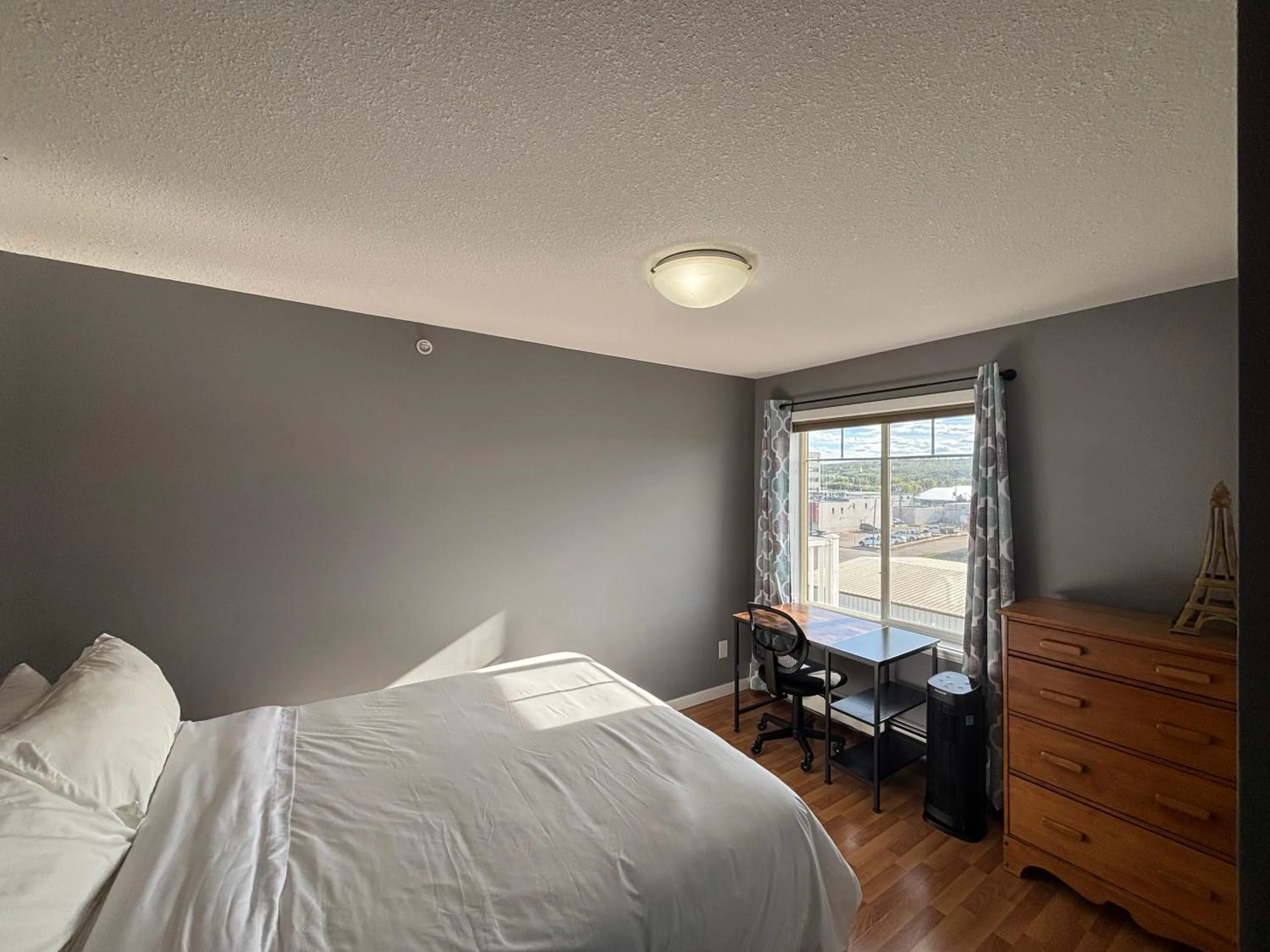 Bedroom, Bed in Top Floor Riverfront Condo with Stellar Sunsets!