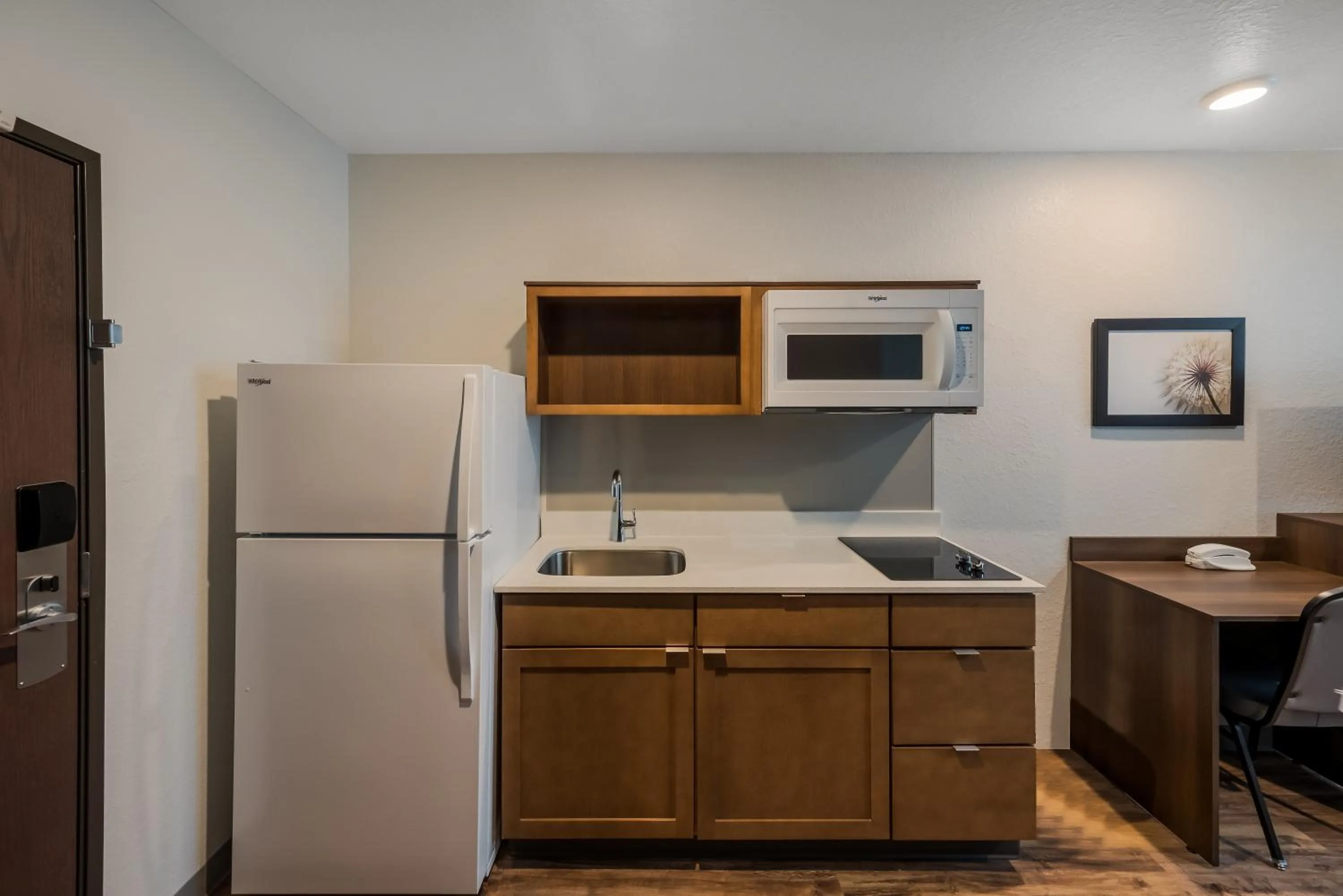 Kitchen or kitchenette in WoodSpring Suites West Palm Beach