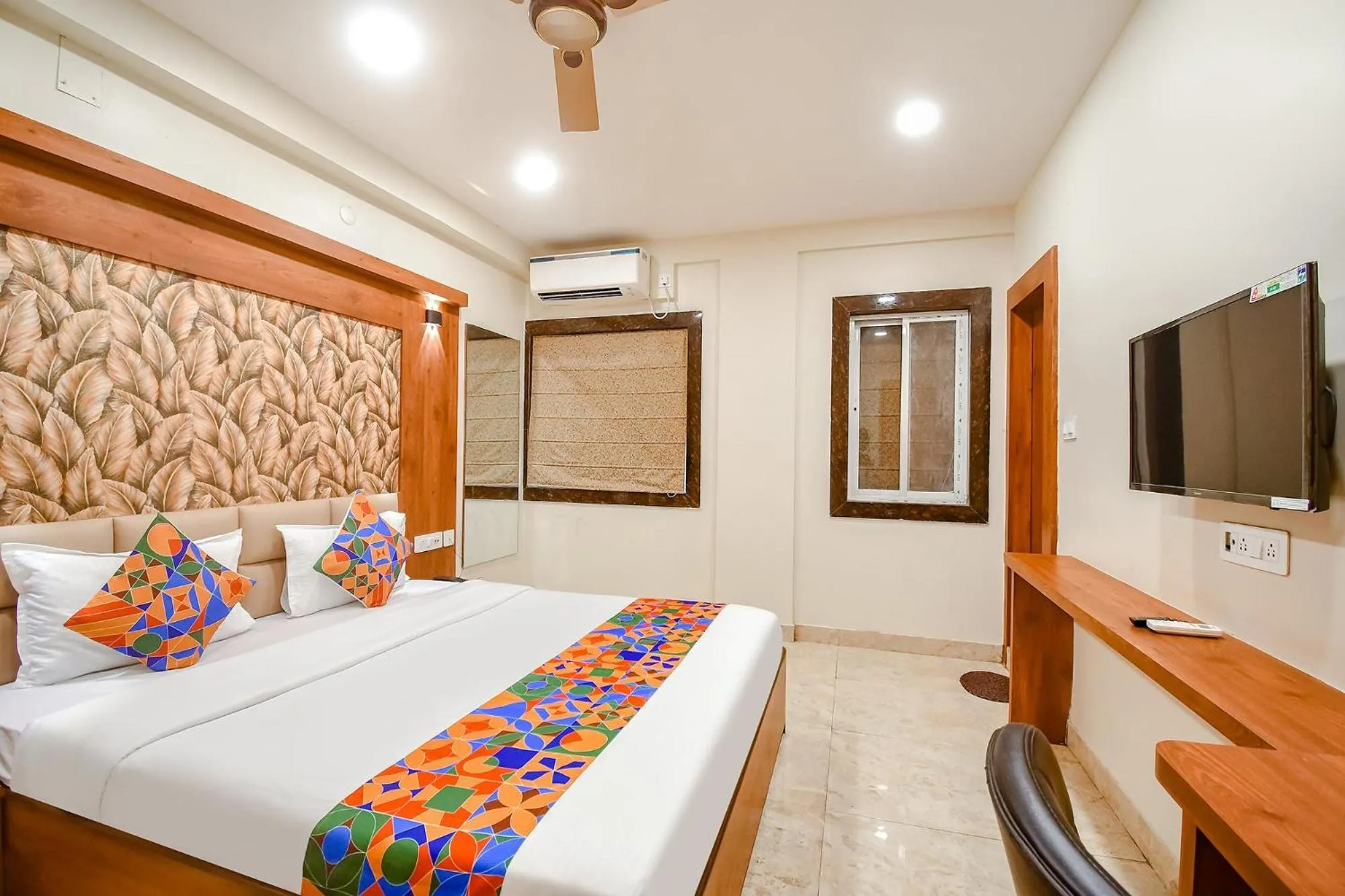 Bed in FabHotel Dreamworld Residency - Near Bisarjan Ghat