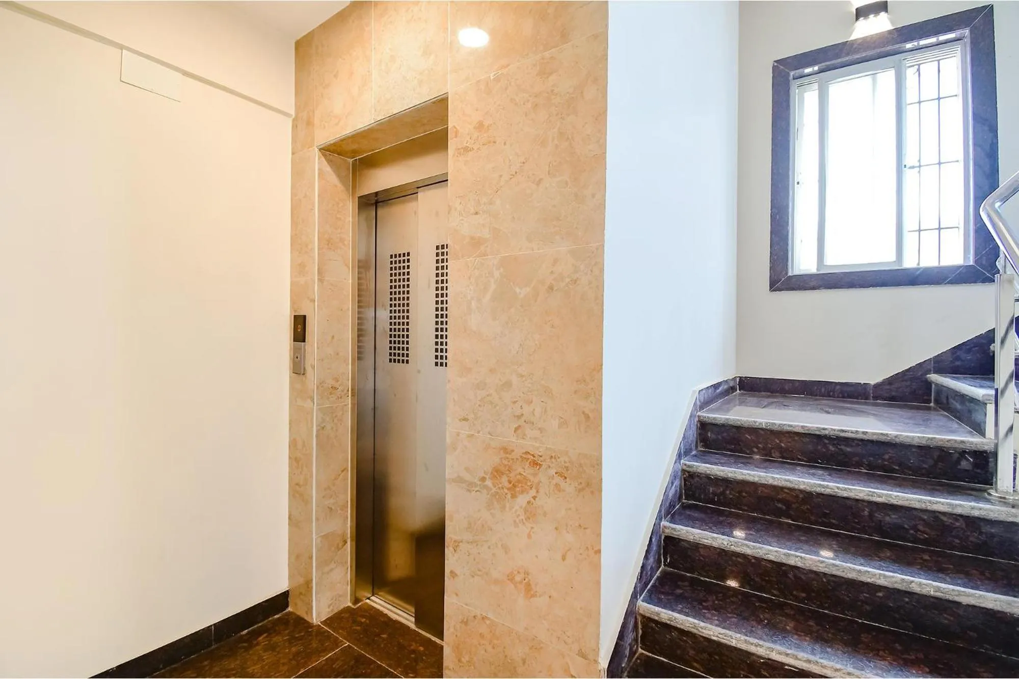 elevator in FabHotel Dreamworld Residency - Near Bisarjan Ghat