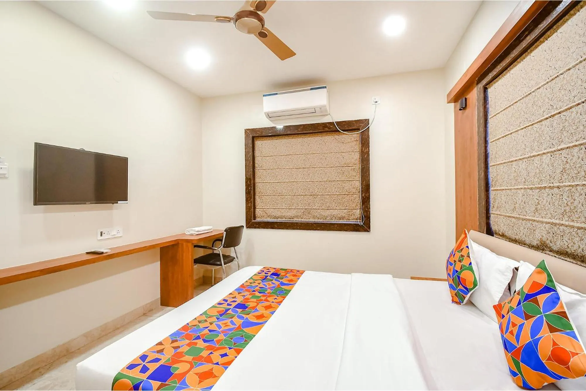 Bed in FabHotel Dreamworld Residency - Near Bisarjan Ghat