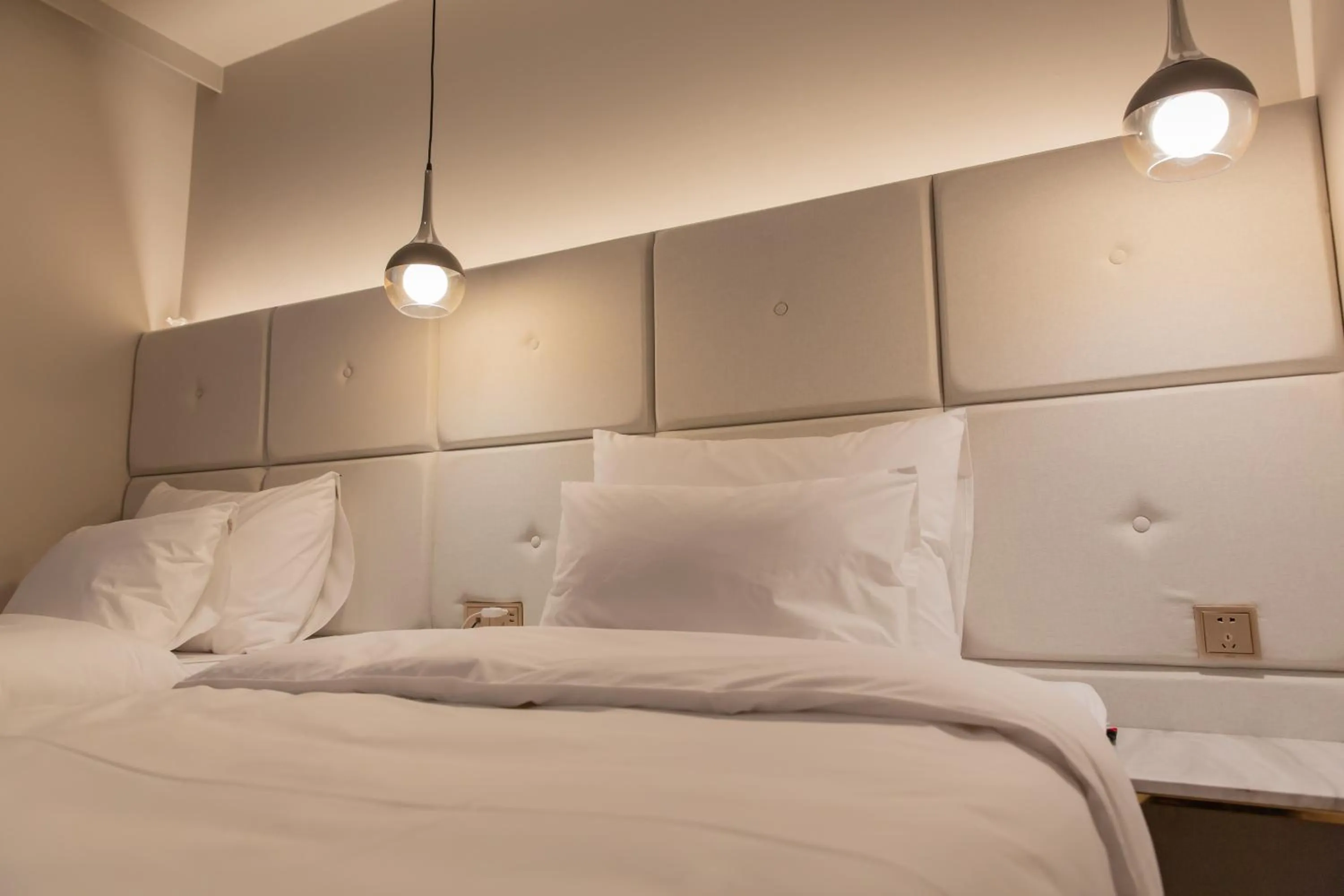 Bed in Denbasta Hotel Heritage