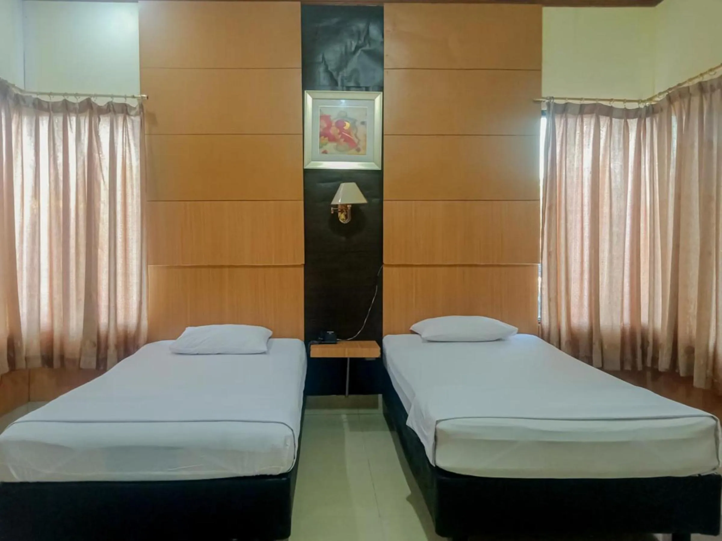 Bedroom, Bed in Homestay Akik Hijau Near Panakkukang