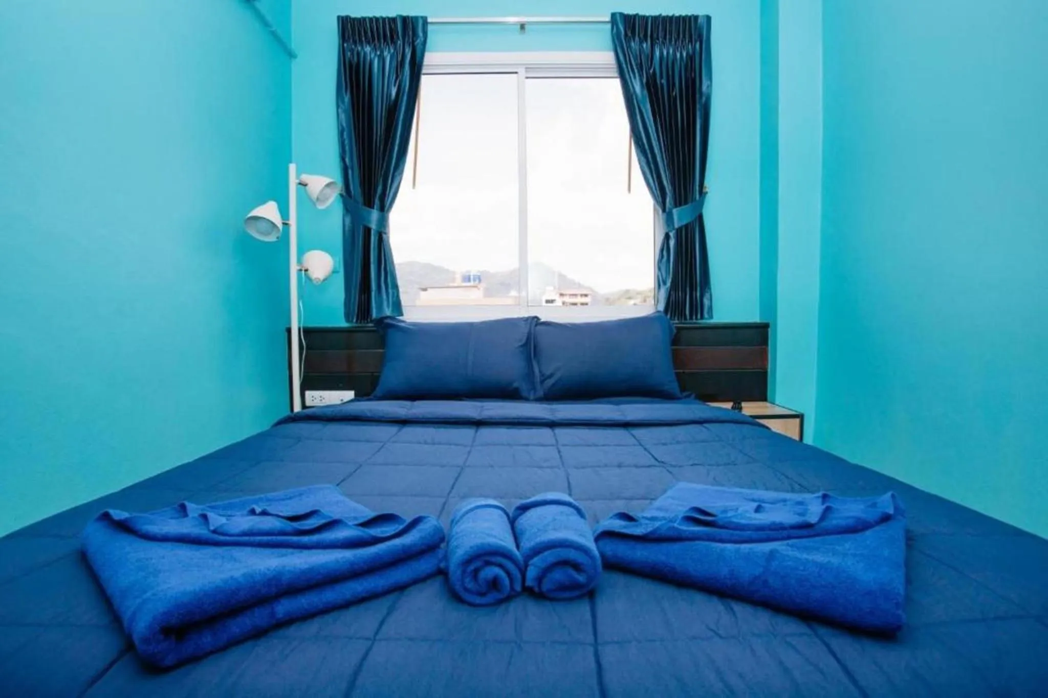 Bed in PATONG BLUE HOTEL