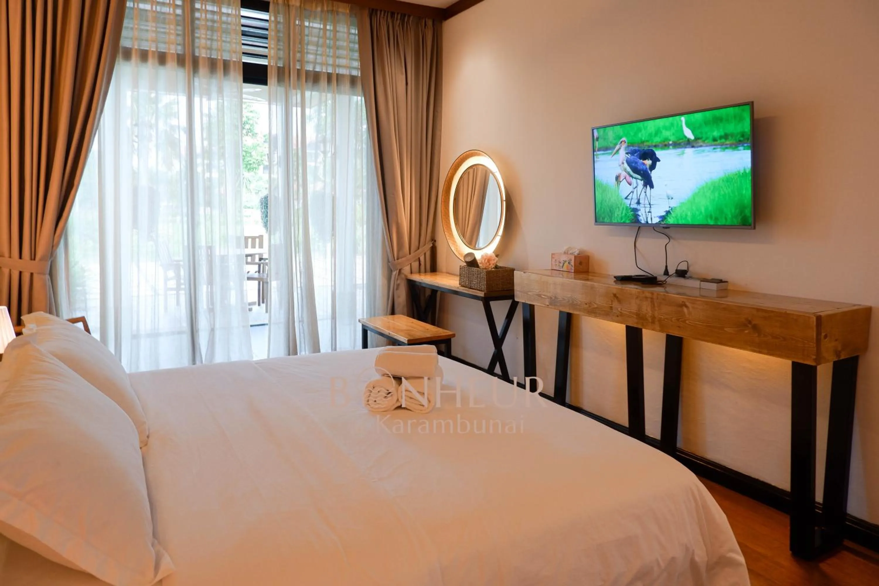 Bed in Bonheur at Karambunai