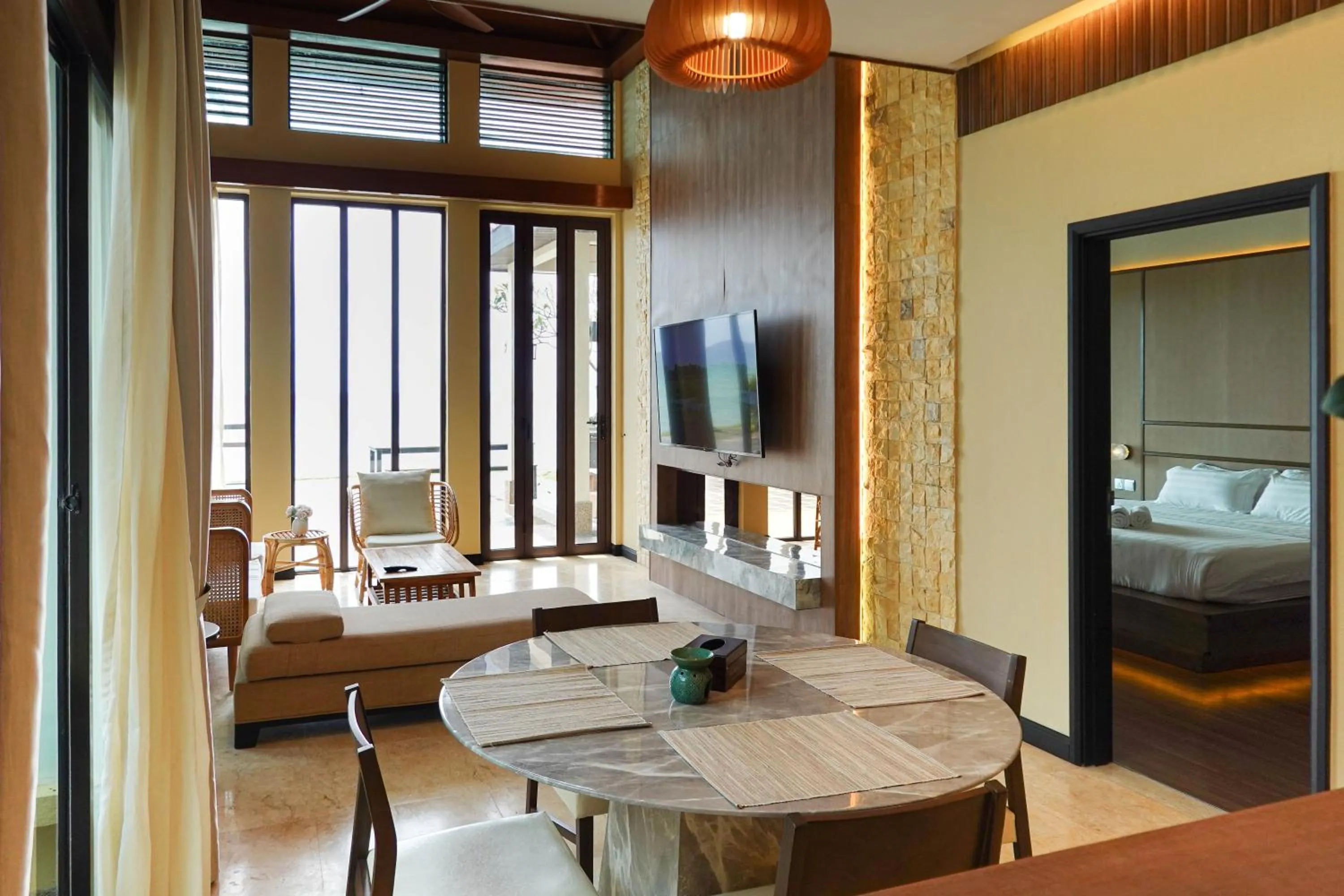 Living room, Bed in Bonheur at Karambunai