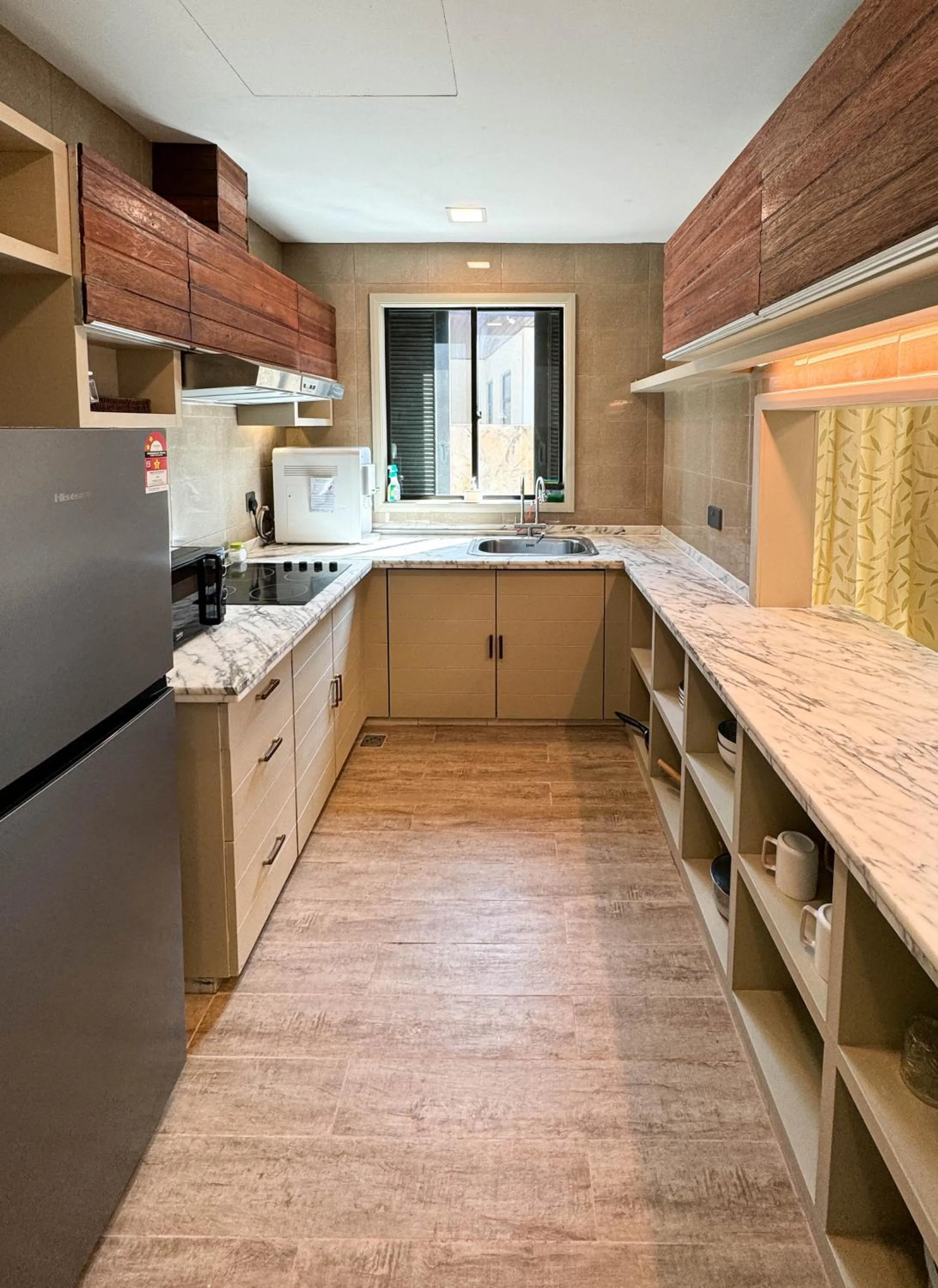 Kitchen or kitchenette in Bonheur at Karambunai