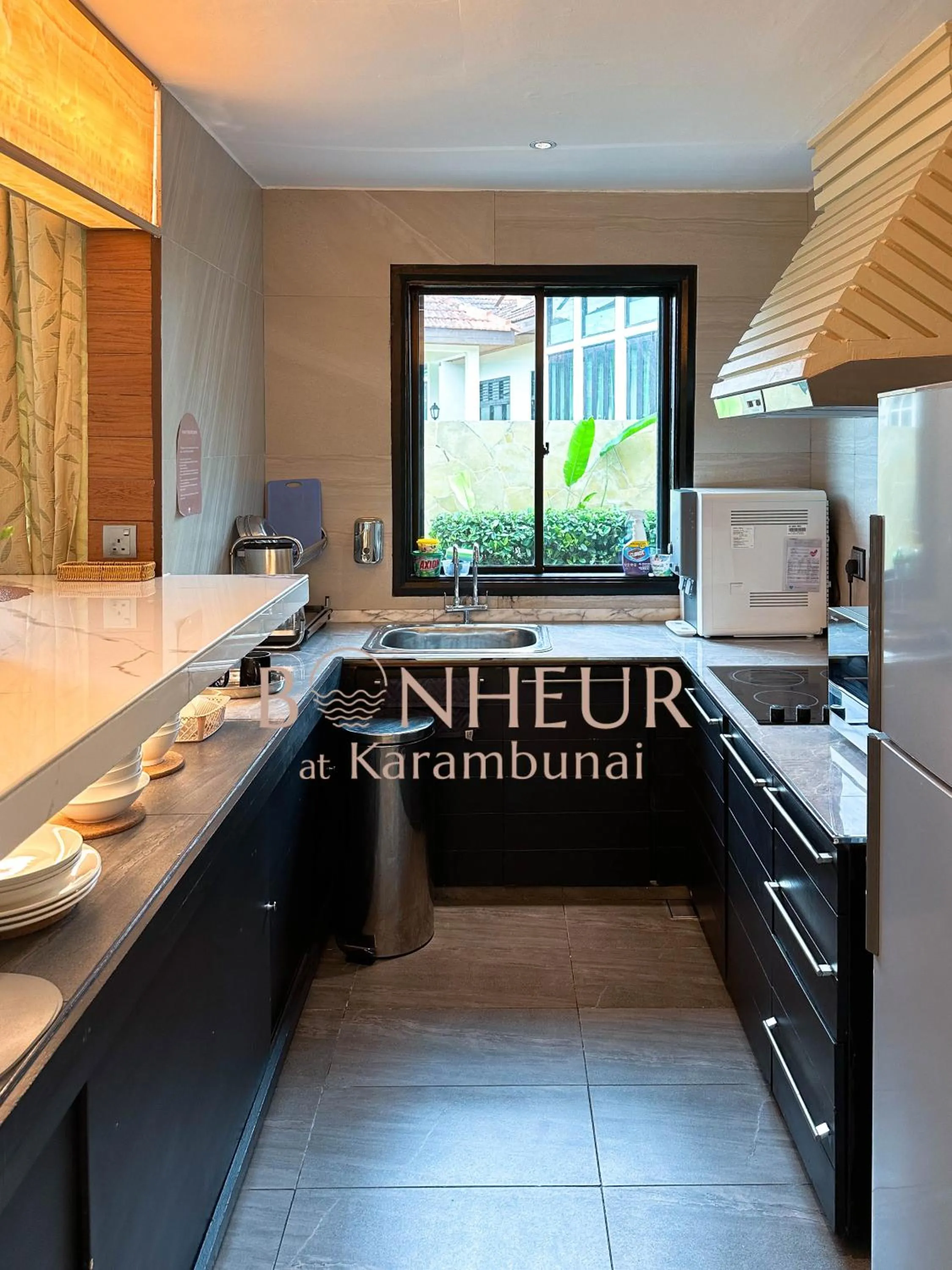 Kitchen or kitchenette in Bonheur at Karambunai