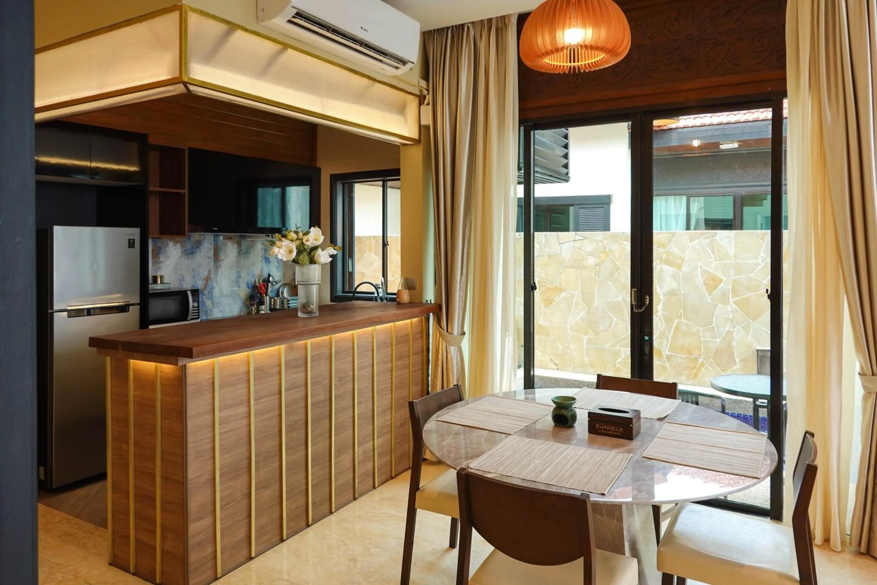 Dining area in Bonheur at Karambunai