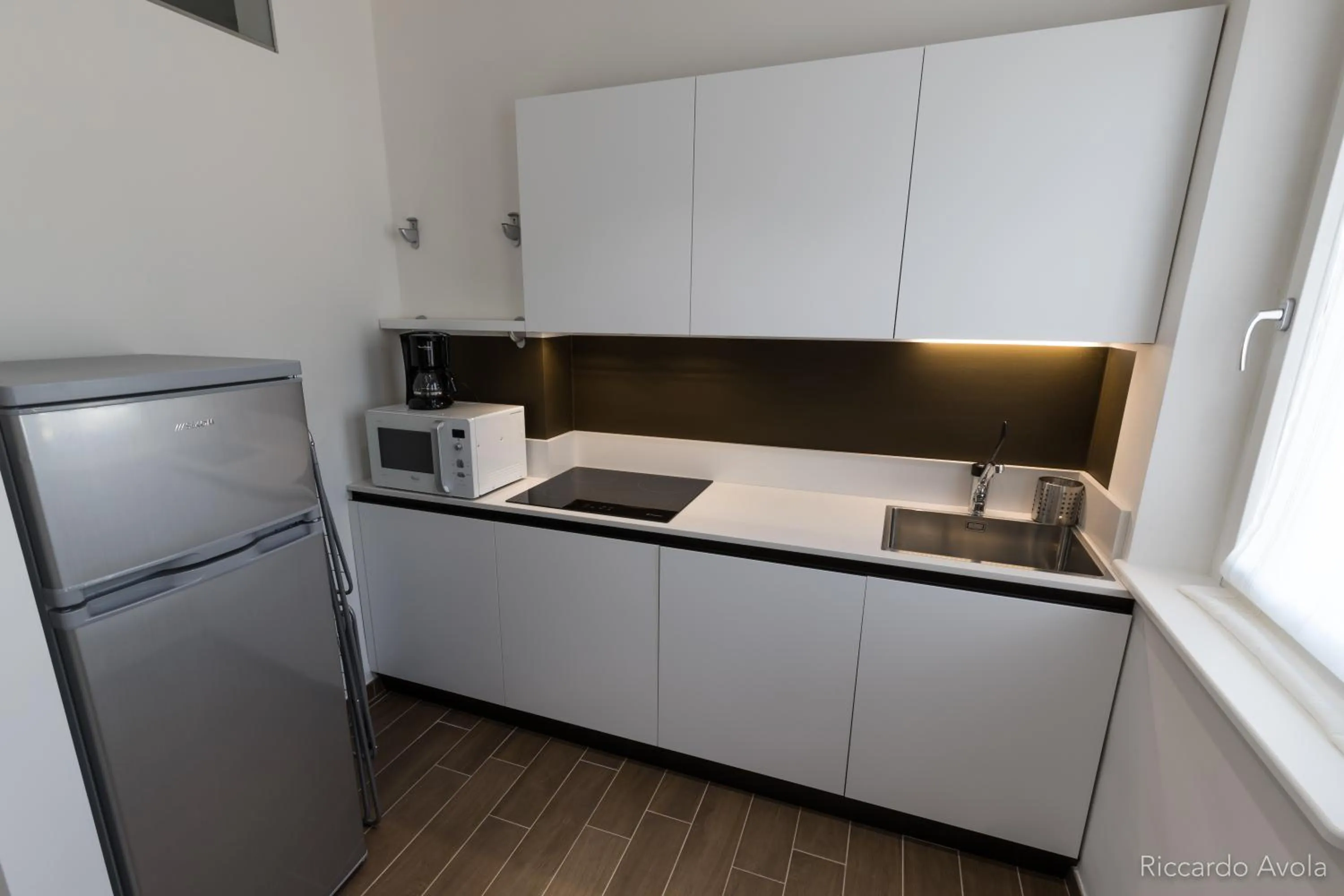 Kitchen or kitchenette in Hotel Aurora & Appartamenti