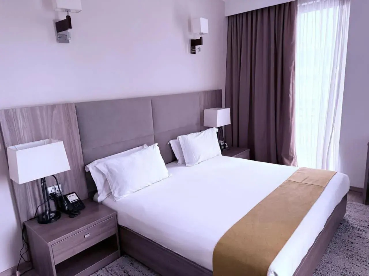 Bed in TH BonRoyal Hotel Bed in TH BonRoyal Hotel