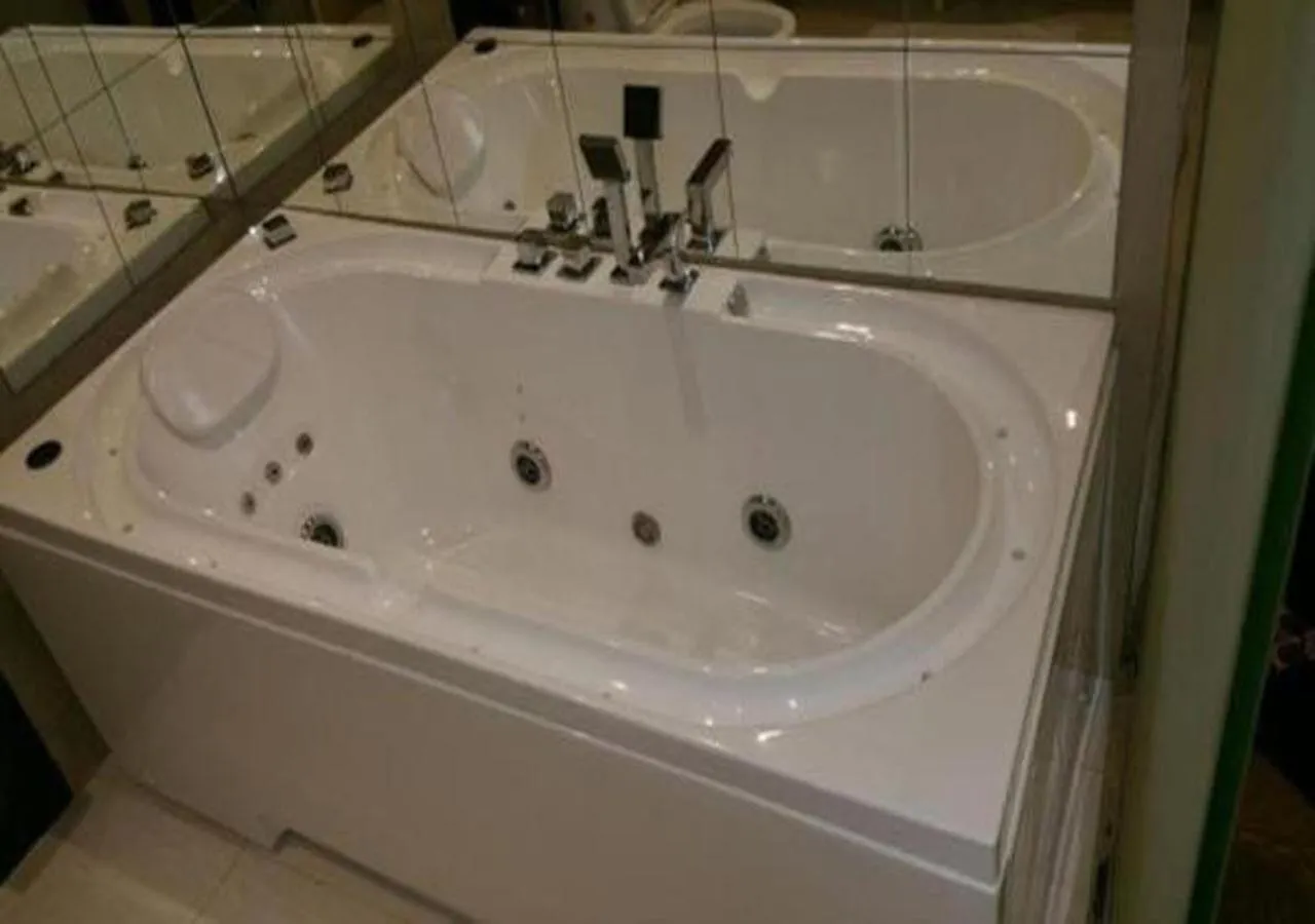 Hot Tub in Rest Night Serviced Apartments- AlHamra