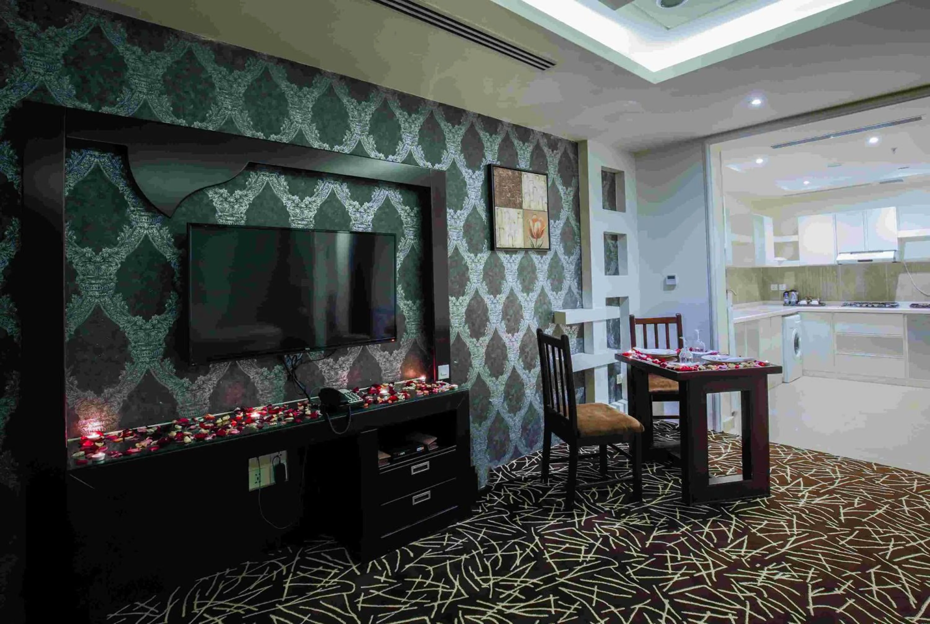 Communal lounge/ TV room in Rest Night Serviced Apartments- AlHamra