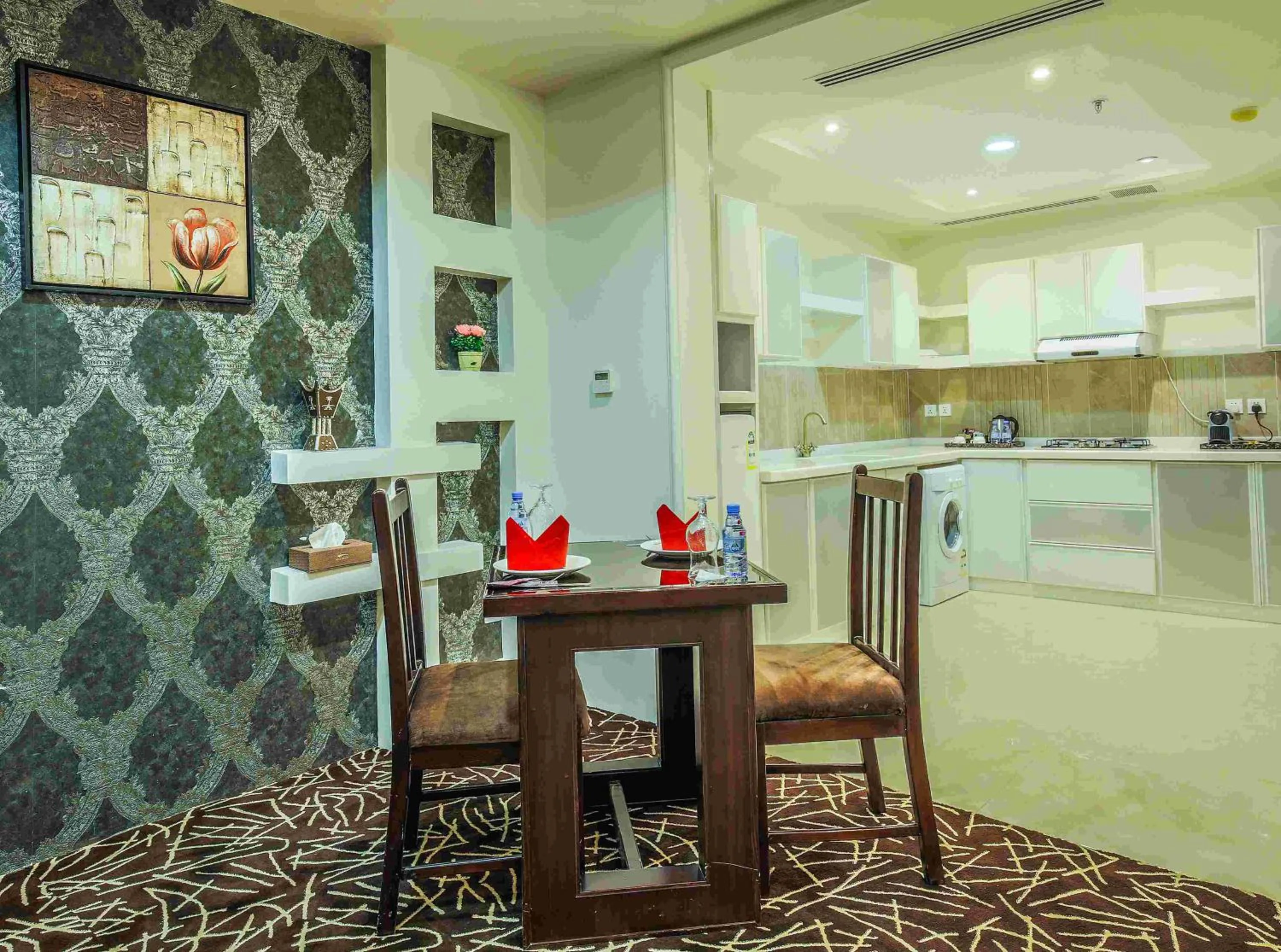 Kitchen or kitchenette in Rest Night Serviced Apartments- AlHamra