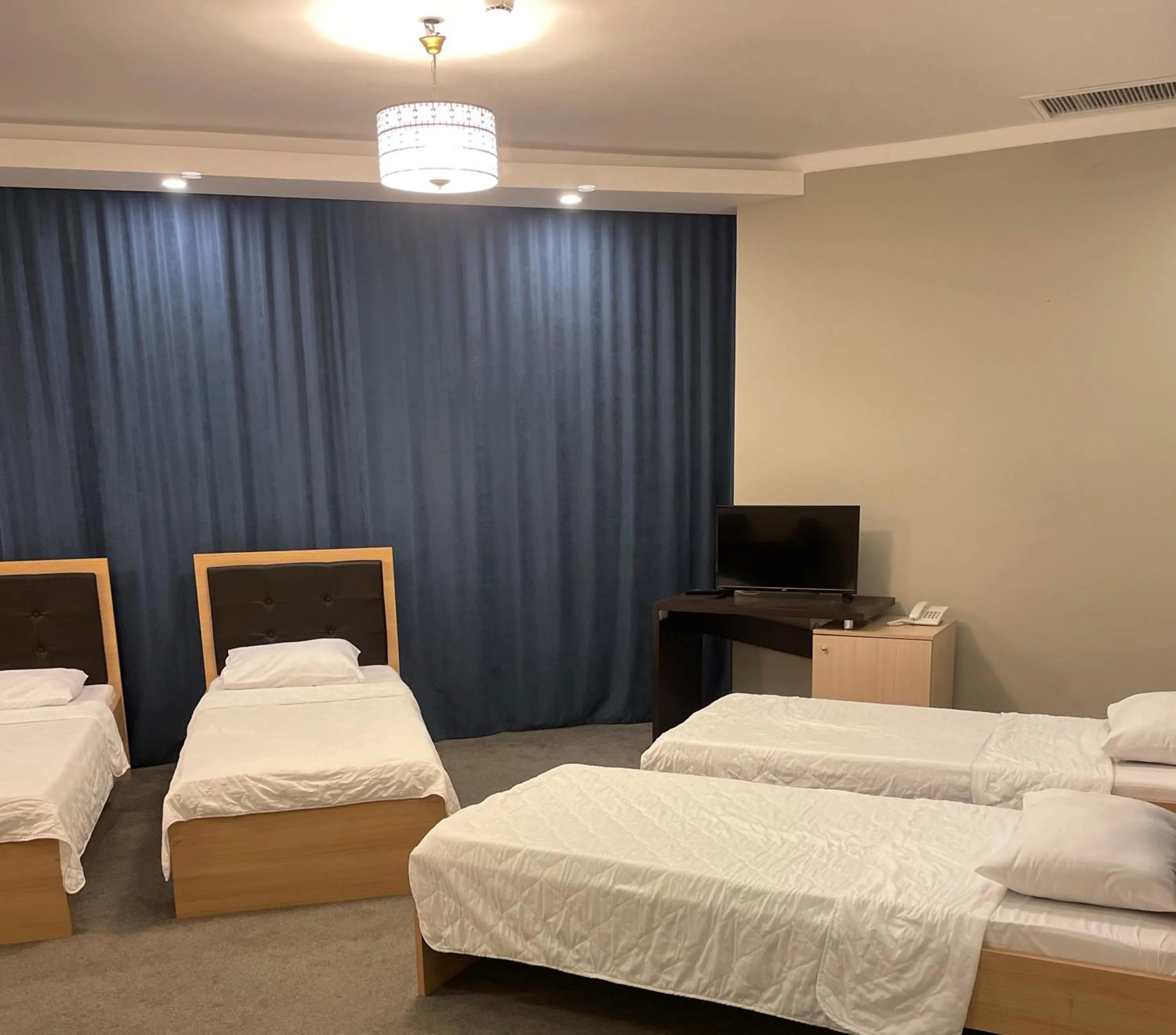 Communal lounge/ TV room, Bed in Arena Hotel Absheron