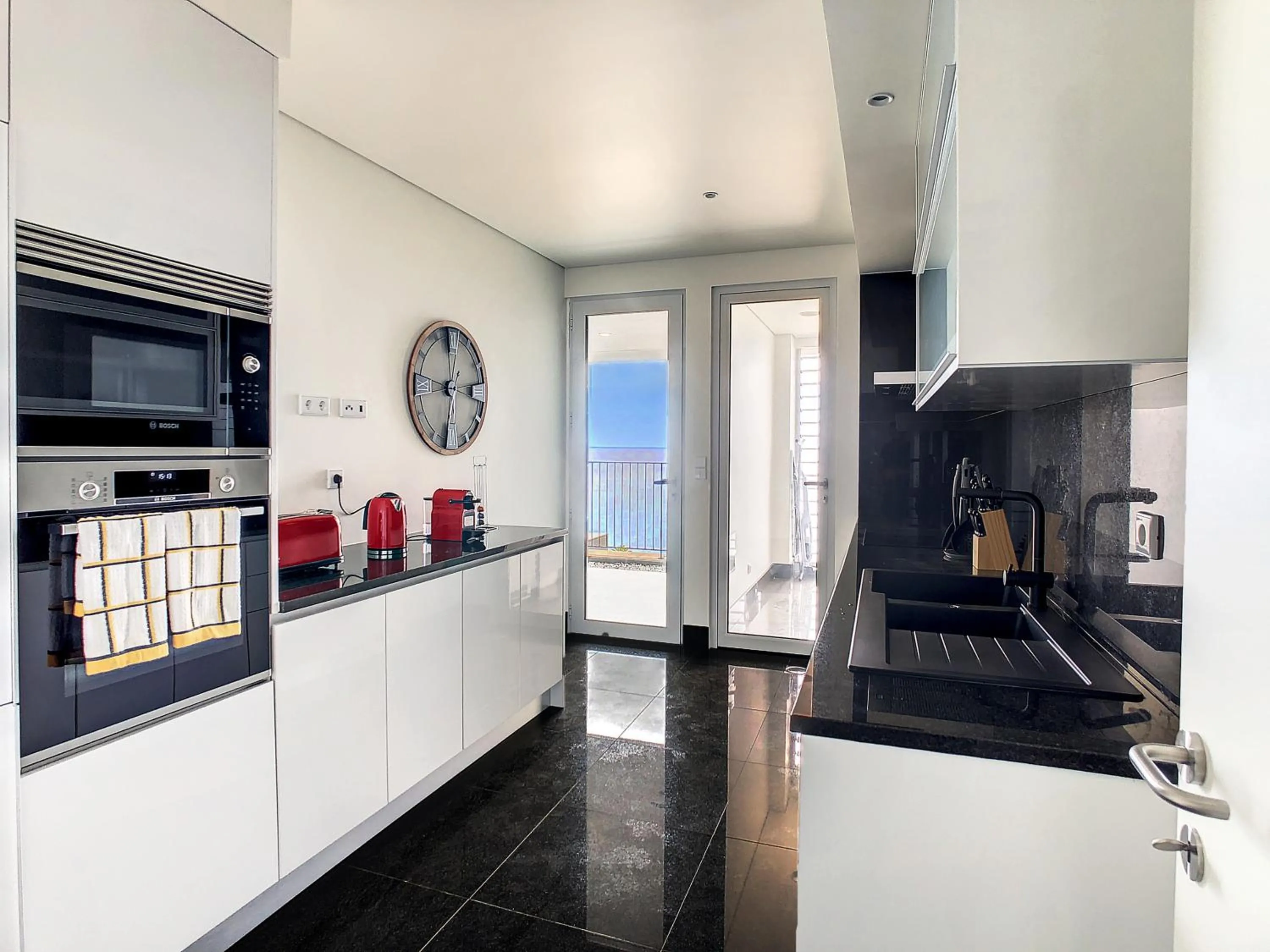 Kitchen or kitchenette in The Best Sea View Apartment by LovelyStay