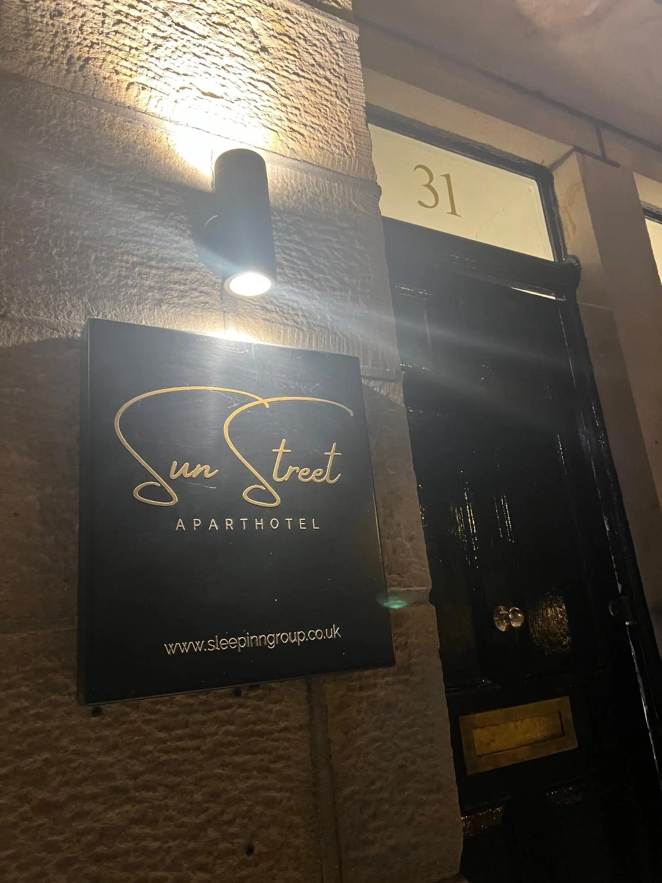 Property logo or sign in Sun Street Aparthotel