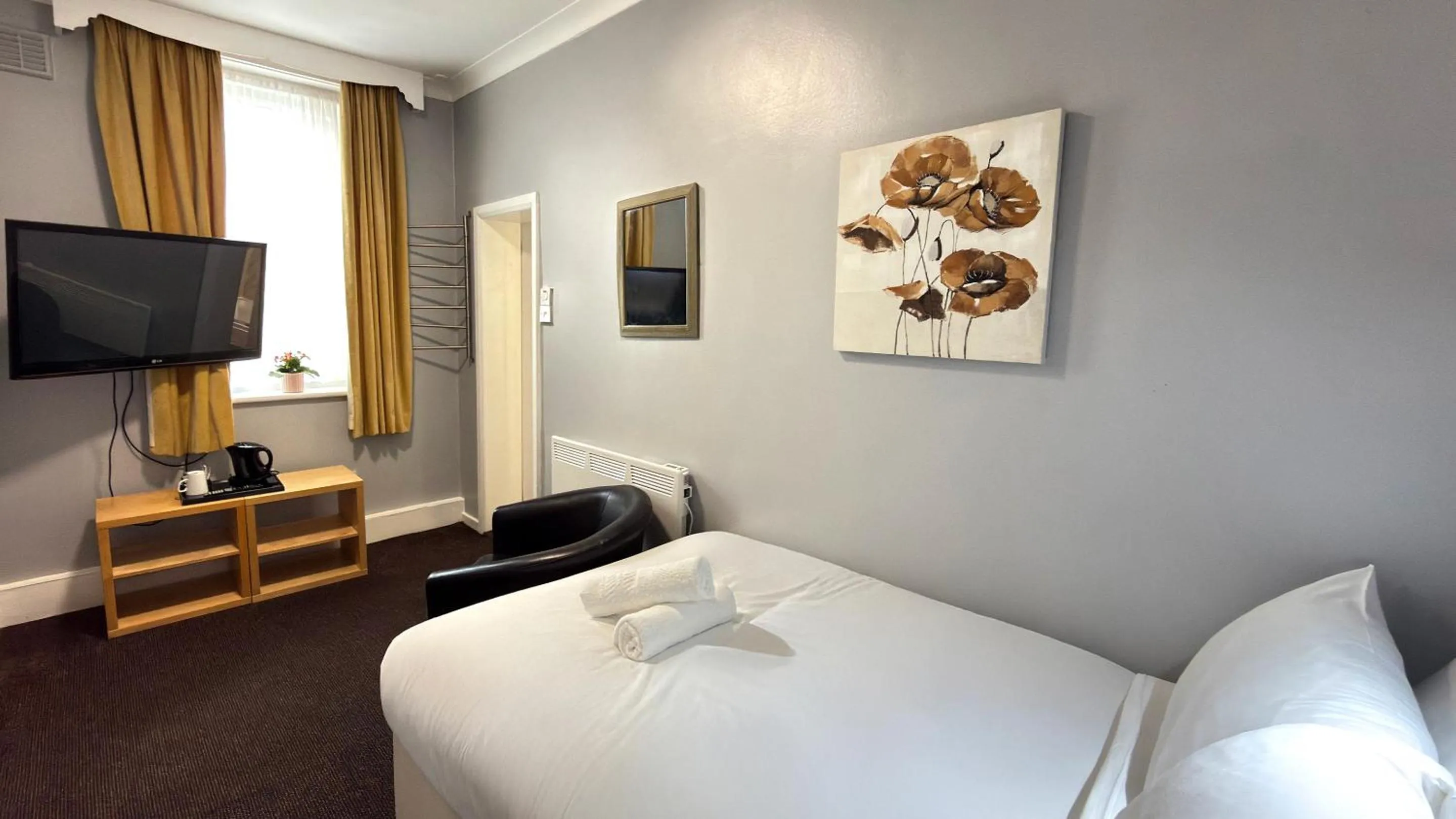 Bed in Lord Nelson Hotel by Compass Hospitality