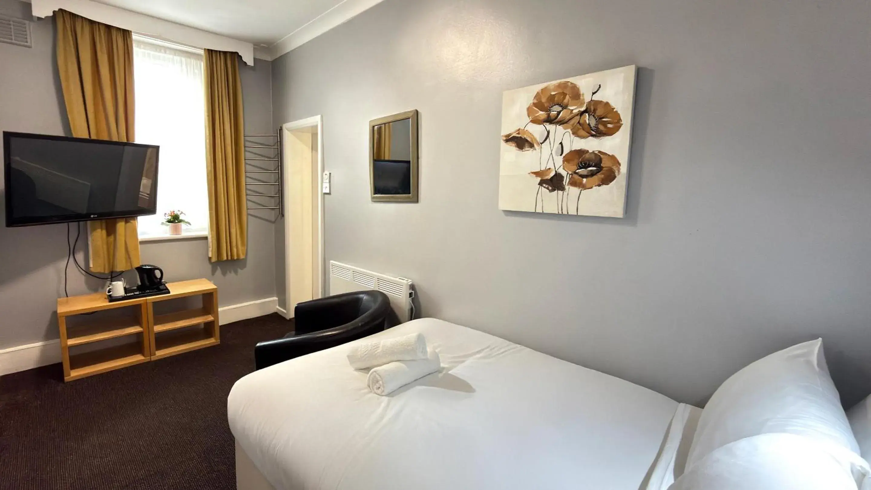 Bed in Lord Nelson Hotel by Compass Hospitality Bed in Lord Nelson Hotel by Compass Hospitality