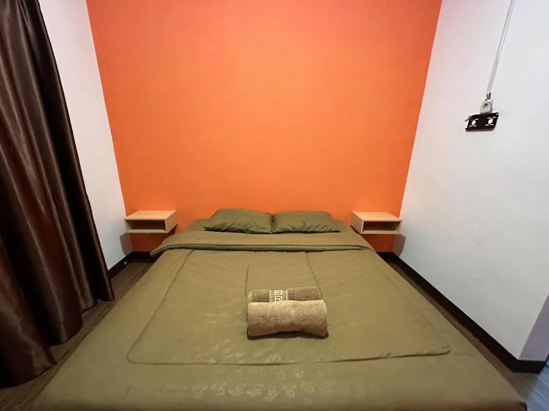 Bed in OYO 1608 Feby Maisonatte