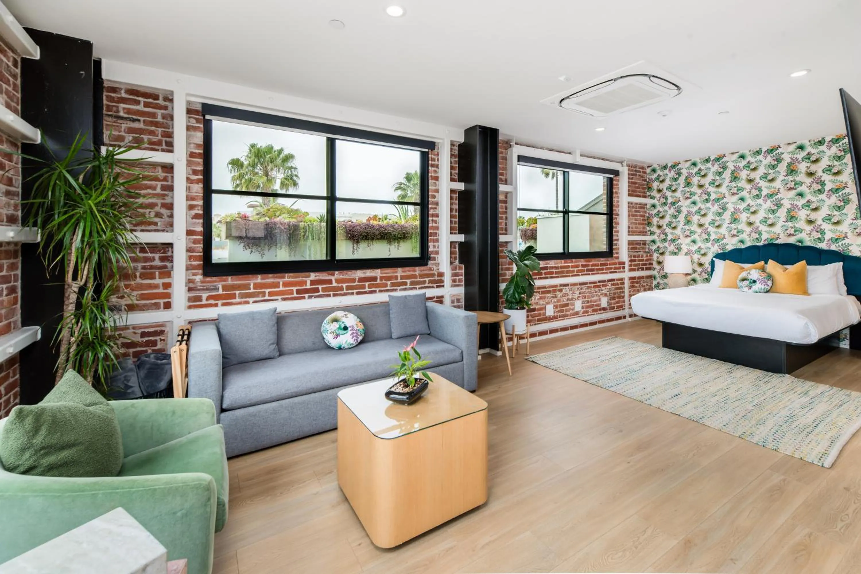 Seating area, Bed in The Brick Boutique Hotel