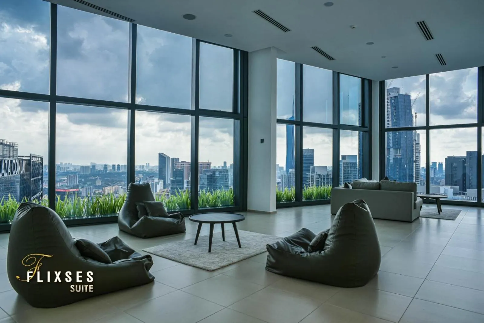 Seating area in Eaton Residence KLCC By Flixses
