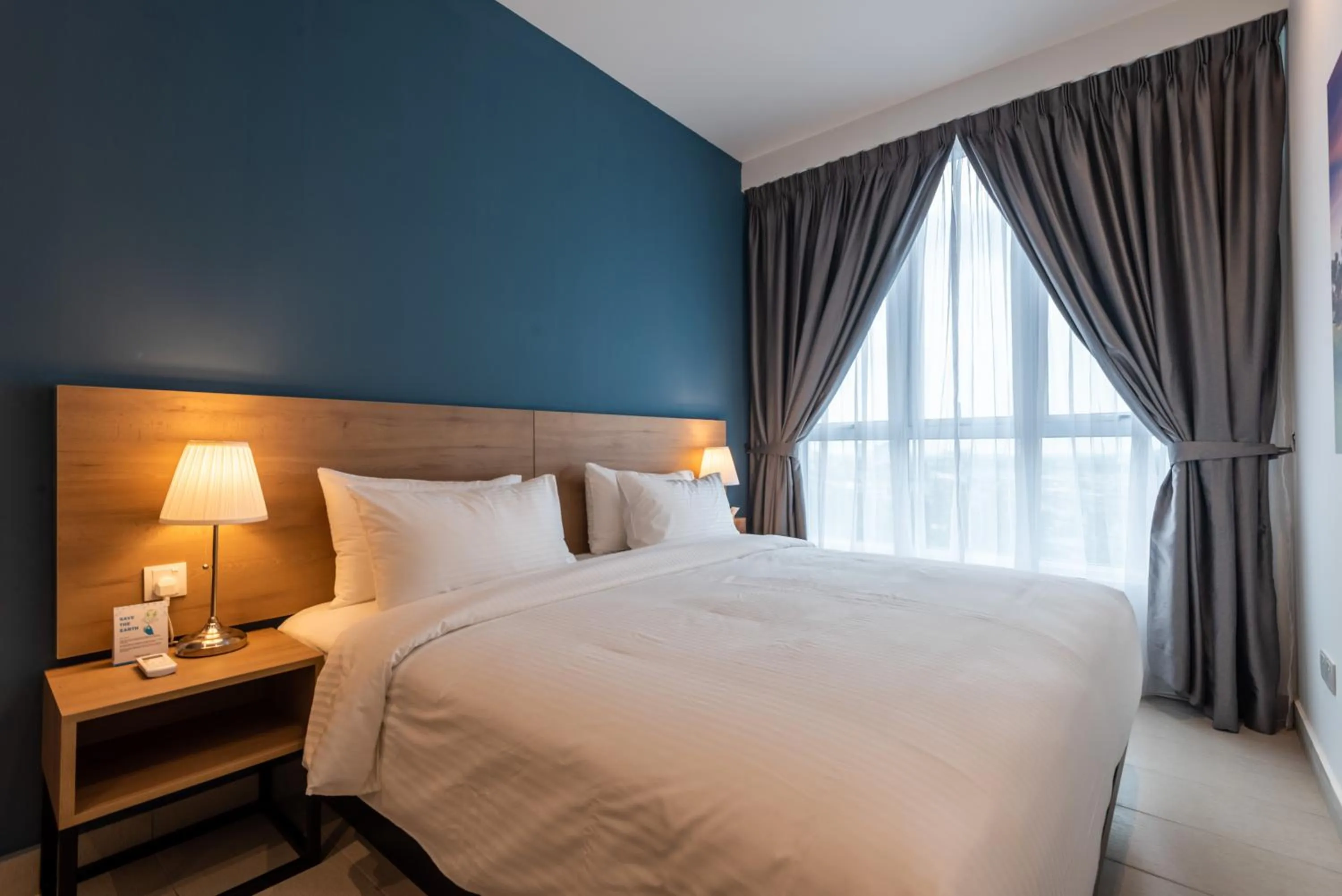 Bed in The Signature Serviced Suites & Office Puchong