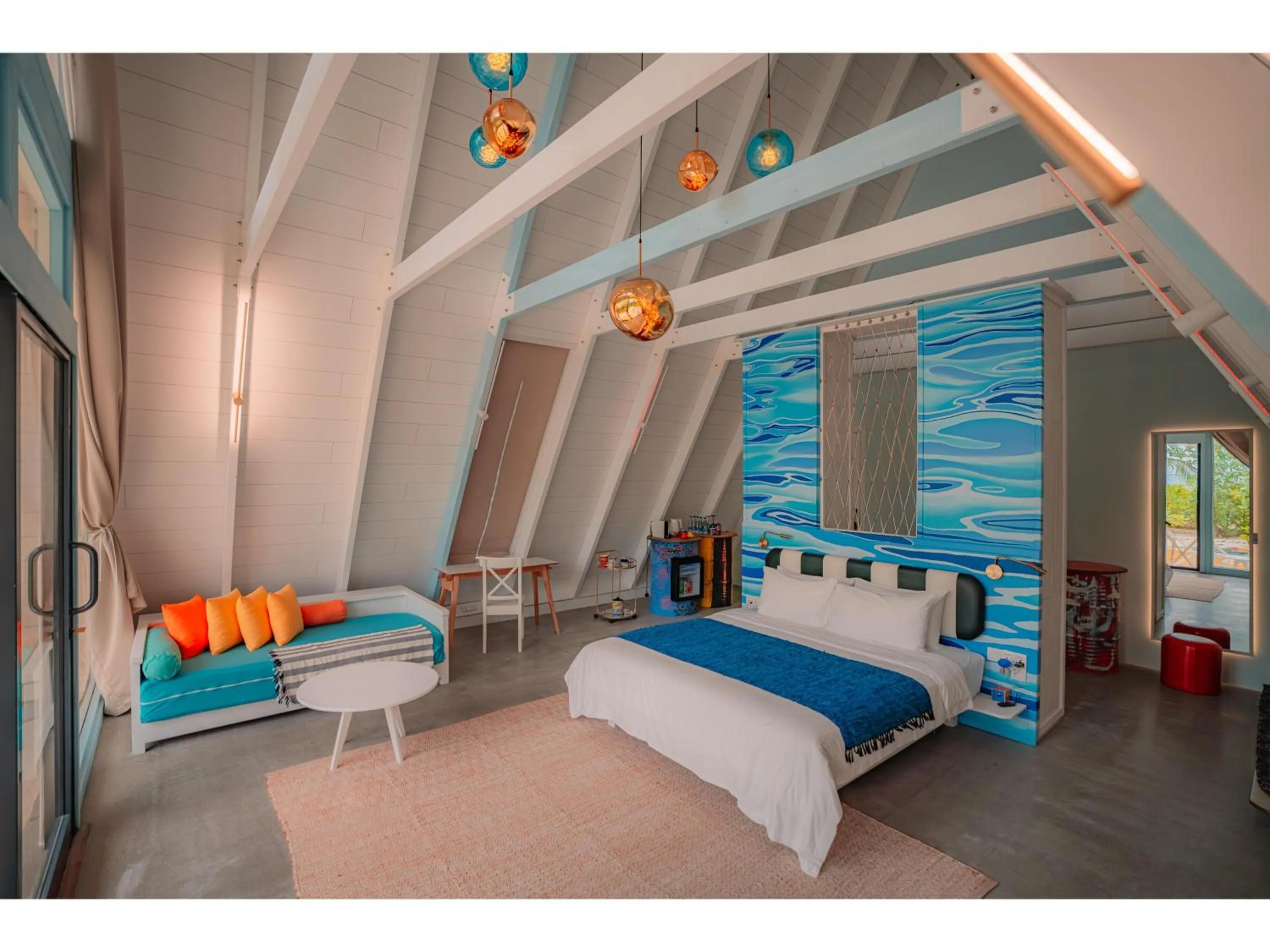 Bed in Oaga Art Resort Maldives - All Inclusive
