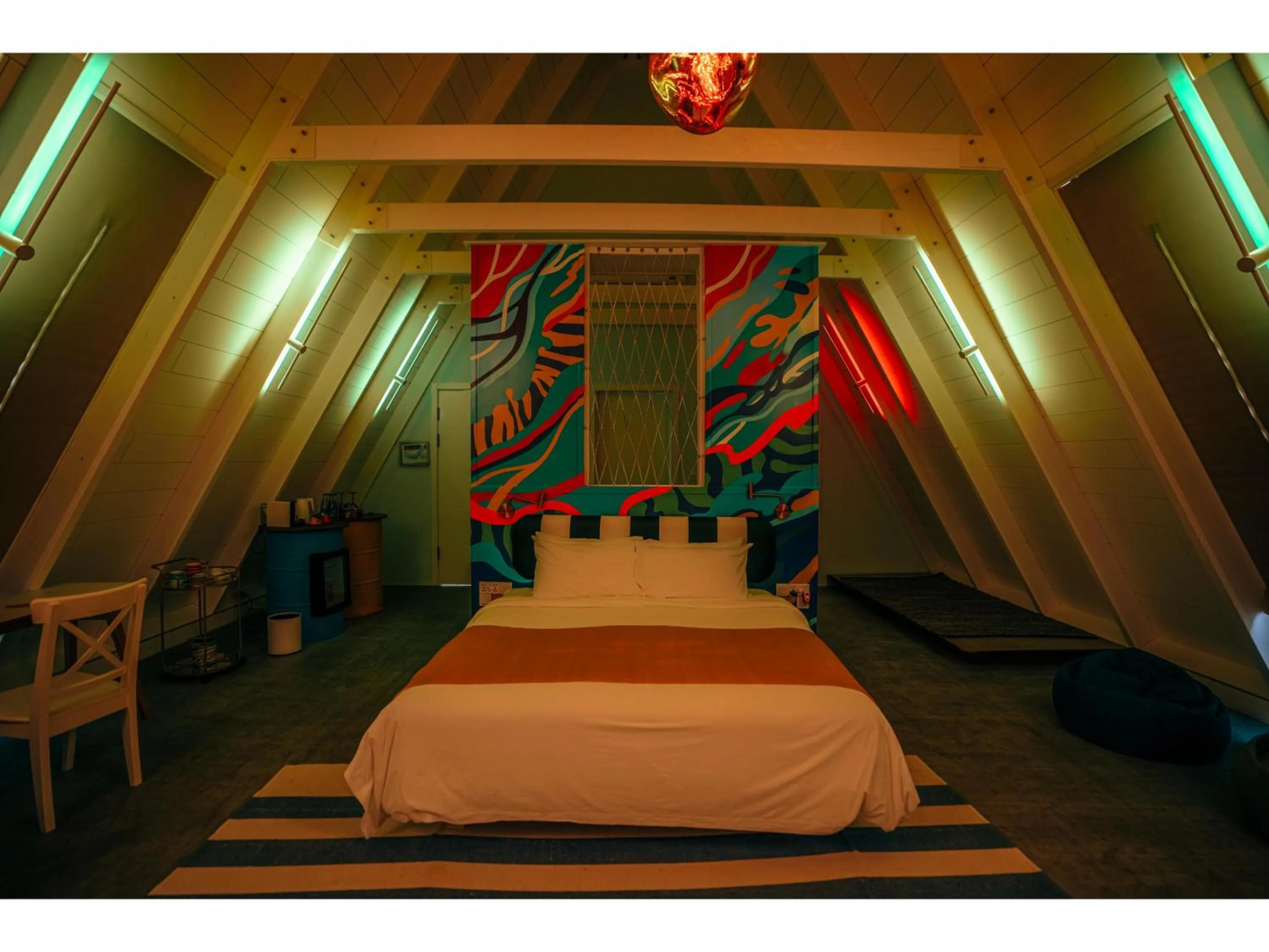 Bed in Oaga Art Resort Maldives - All Inclusive