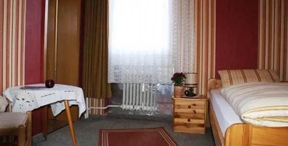Photo of the whole room, Bed in Gasthaus Pension Schumbert