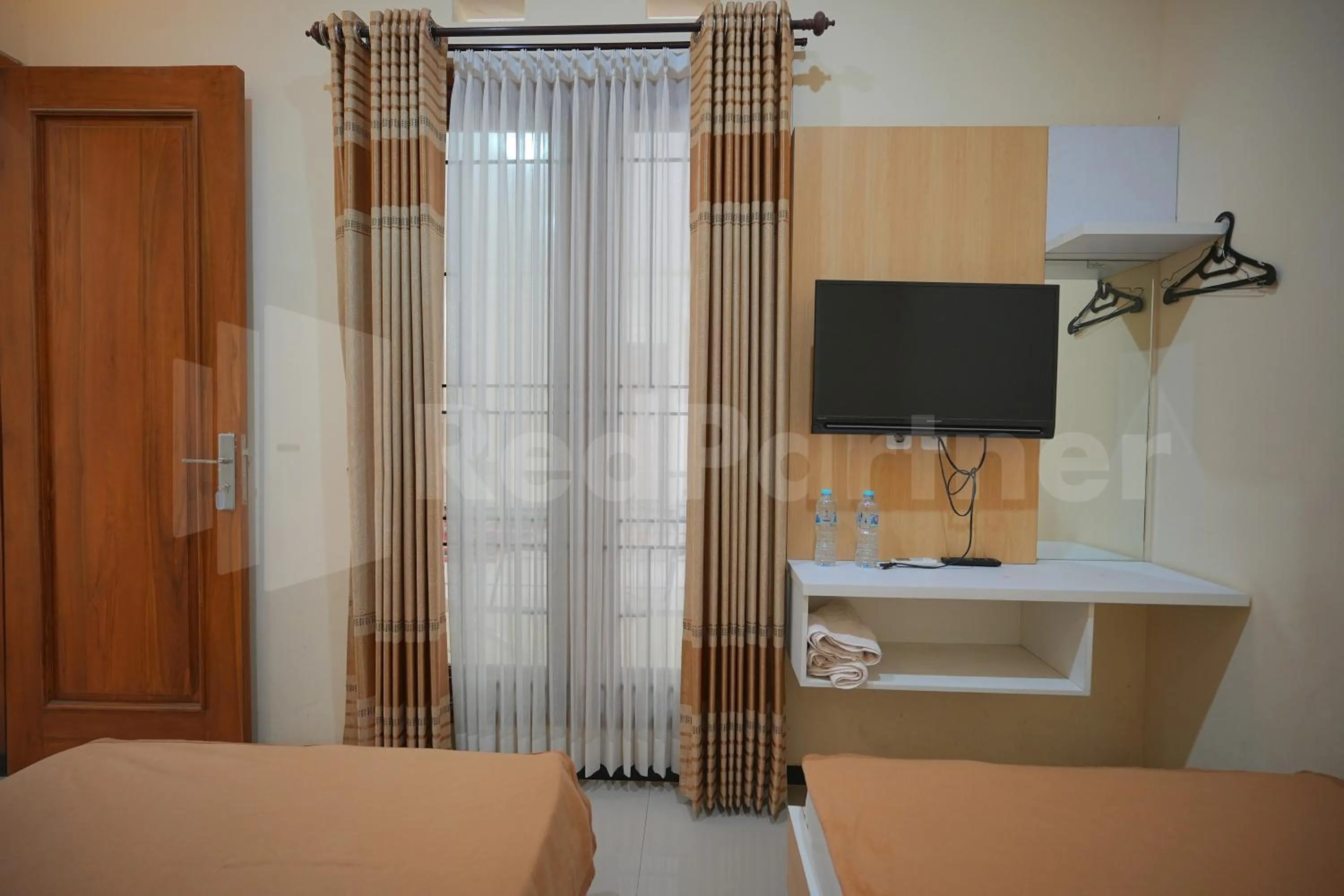 Bedroom, Bed in One & Quin Guest House Syariah Mitra RedDoorz