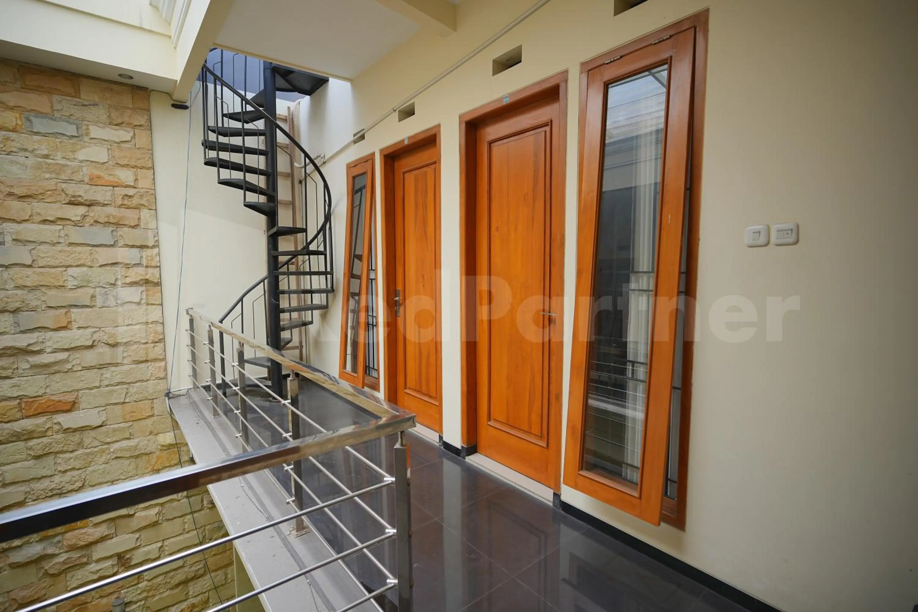 Balcony/Terrace in One & Quin Guest House Syariah Mitra RedDoorz