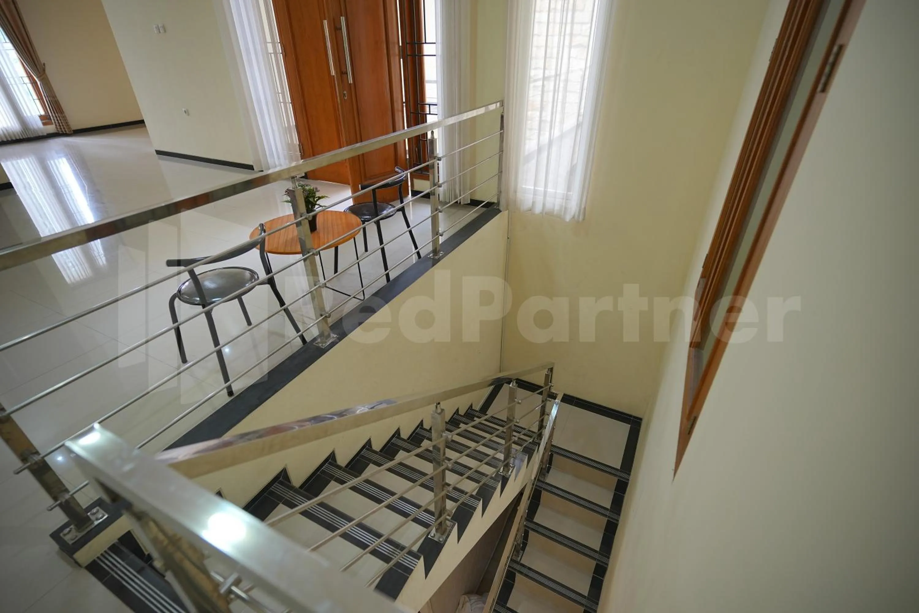 Floor plan in One & Quin Guest House Syariah Mitra RedDoorz