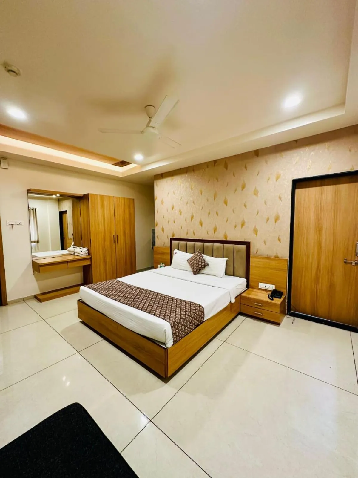 Bedroom, Bed in Hotel TrushaDham Near to Mahalaxmi Temple Kolhapur