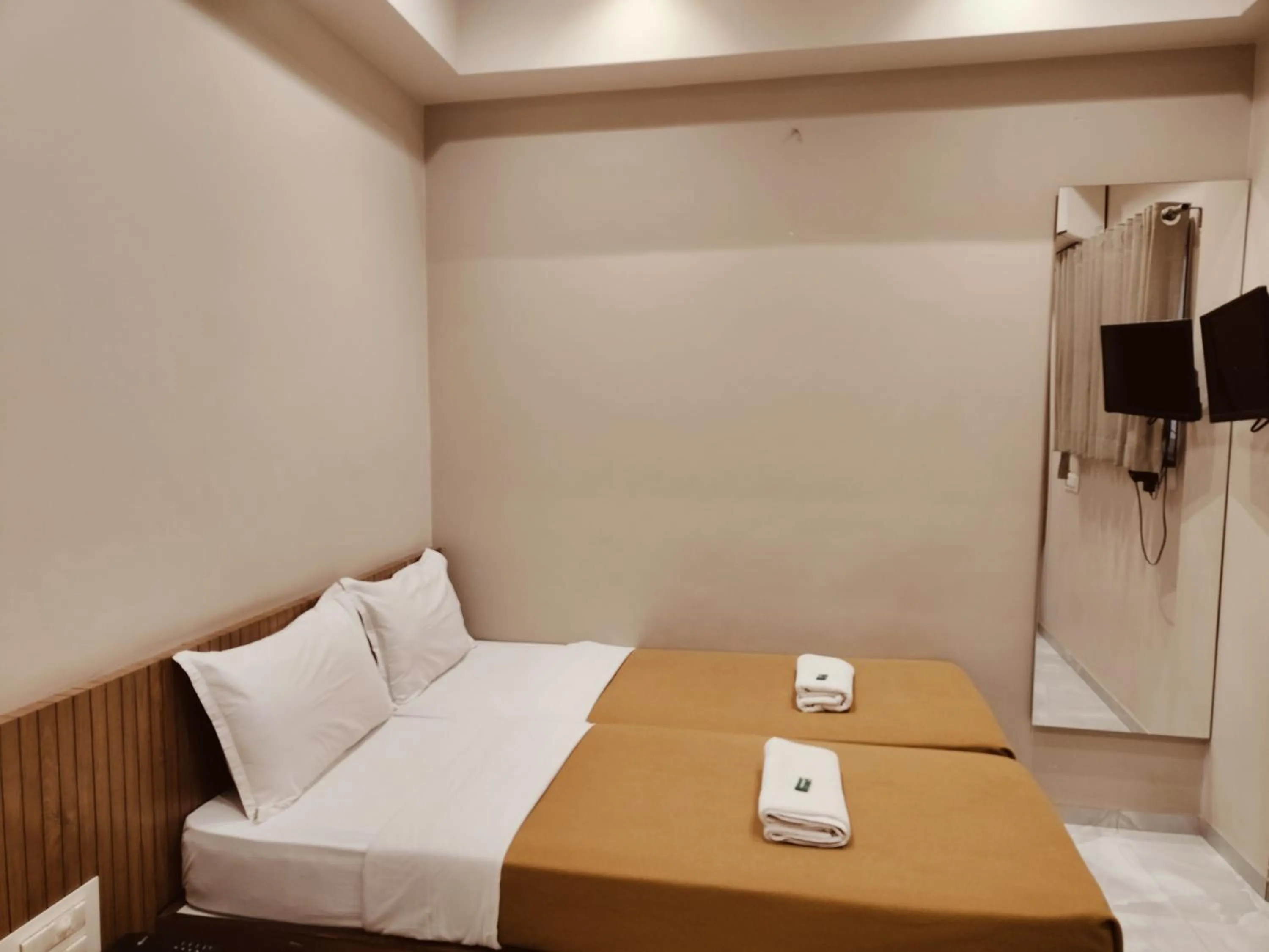 Bed in Hotel TrushaDham Near to Mahalaxmi Temple Kolhapur