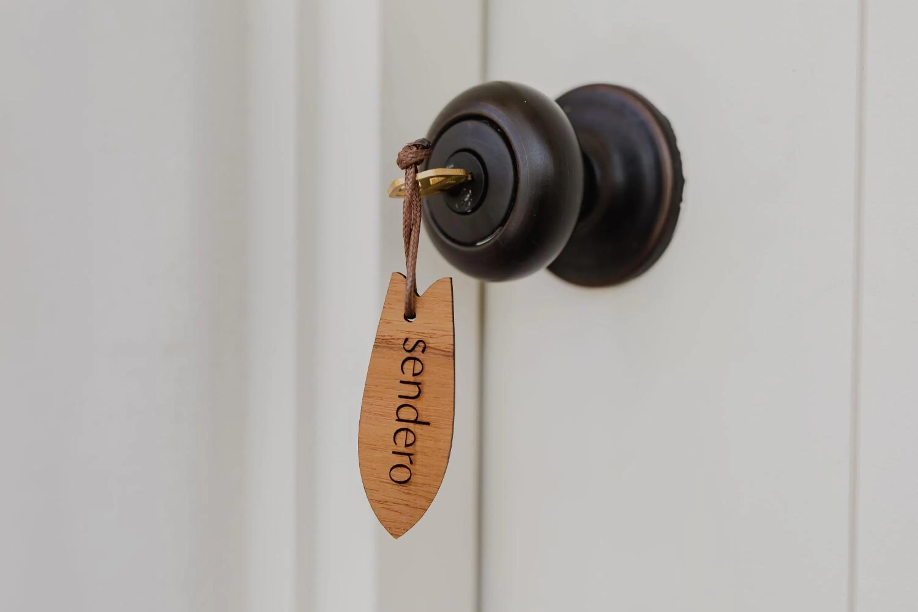 Property logo or sign in Sendero Hotel