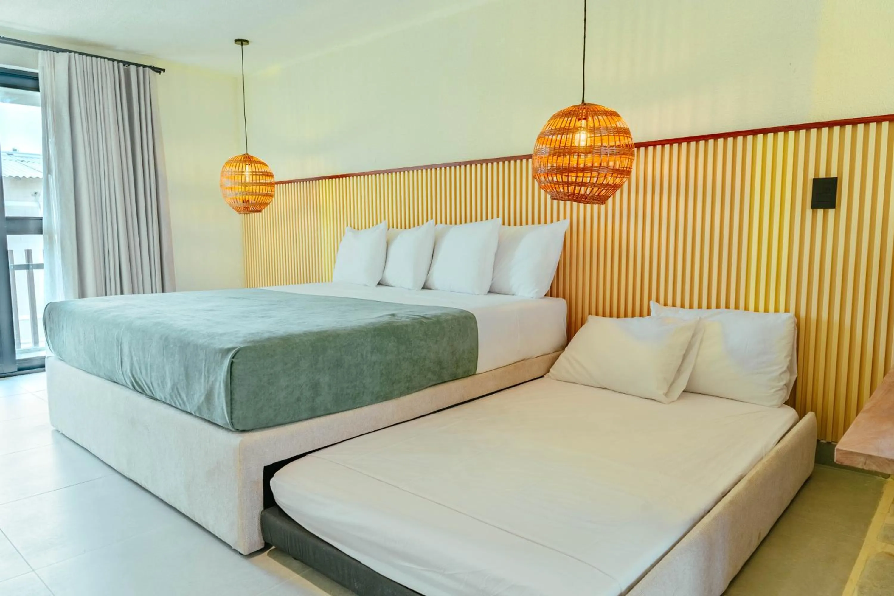 Bed in Makáry Beach Tolú by Bernalo Hotels